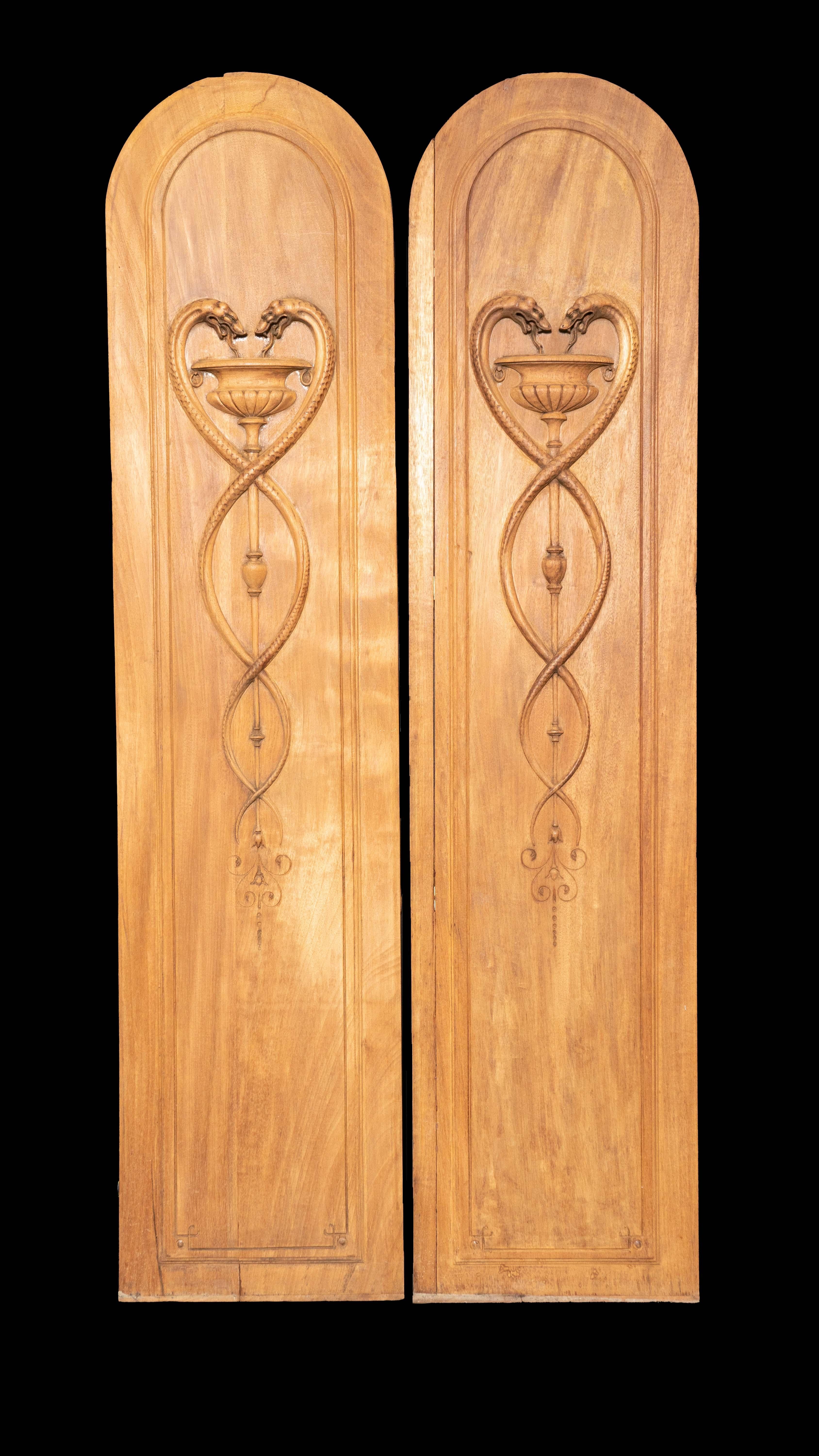 Large pair of 19th century French carved wood pharmacy panels with bowl of Hygieia symbol. 

Bowl of Hygieia is one of the symbols of pharmacology. It is one of the most ancient and important symbols related to medicine in western