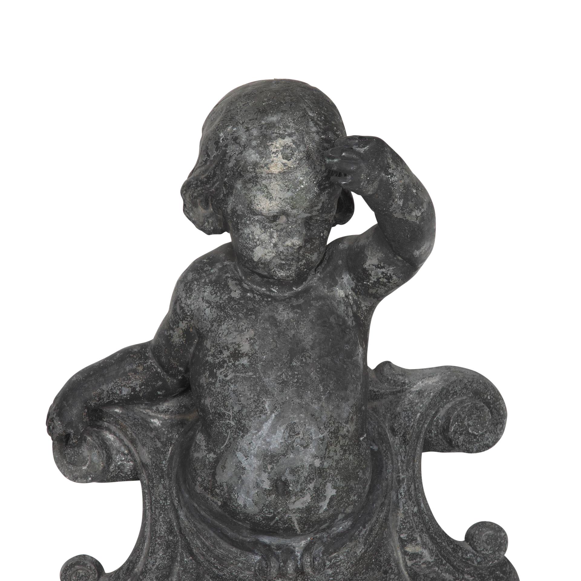 Magnificent pair of 19th Century putti made from cast alloy.
Correct pair in left and right arms.