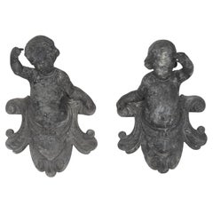 Pareja de Figuras Putti Francesas de Aleación Fundida del Siglo XIX