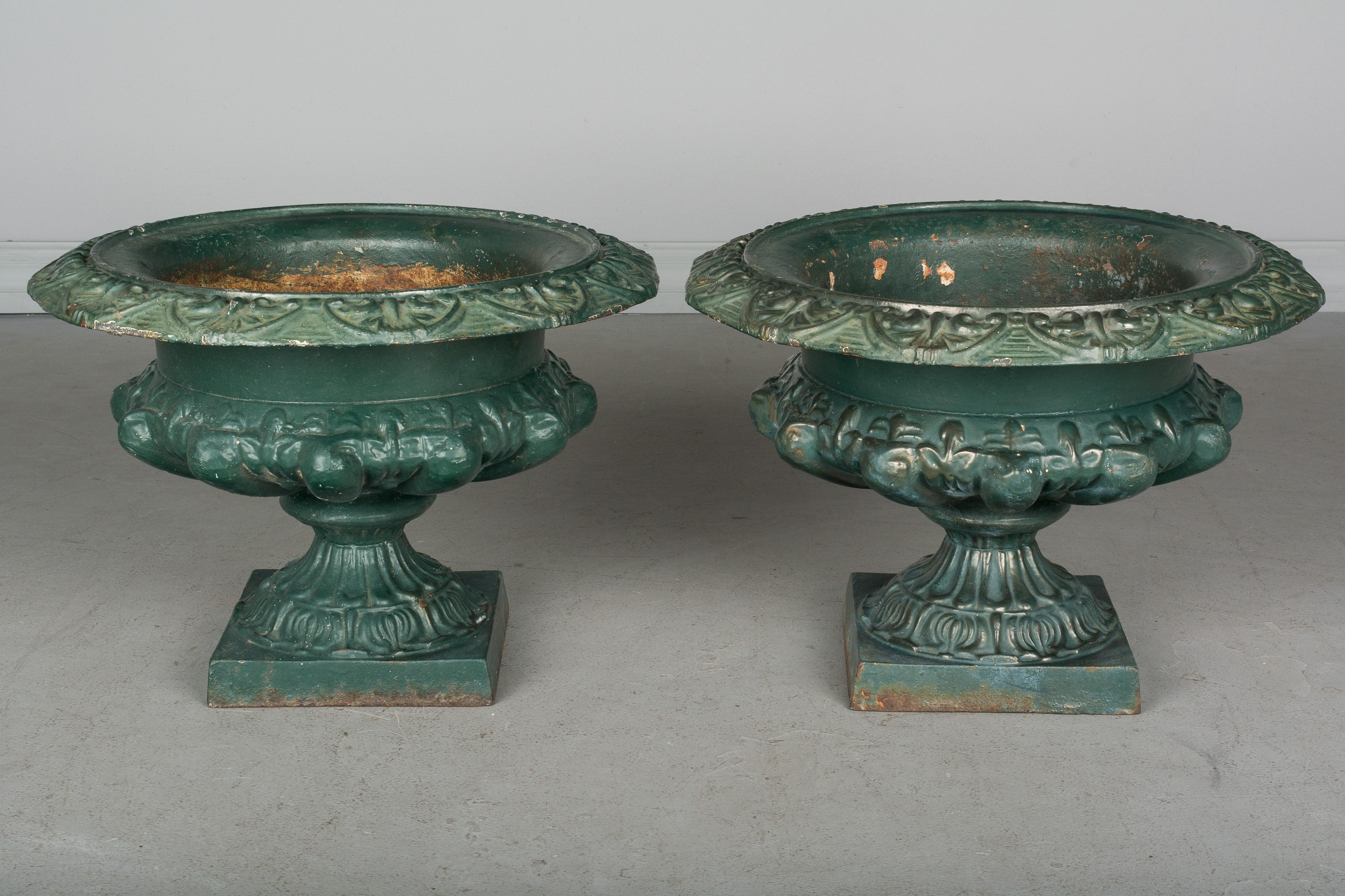 Pair of 19th Century French Cast Iron Urns 1