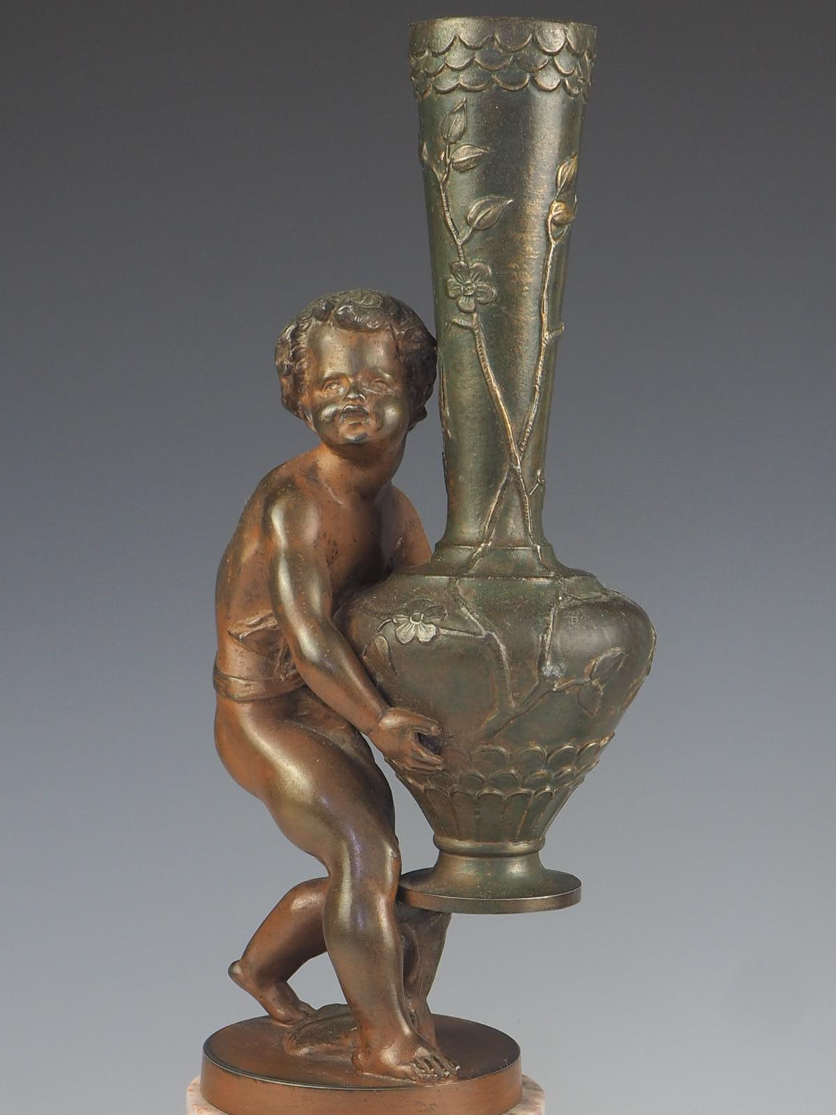 Bronzo Coppia di vasi da fiori con cherubini 