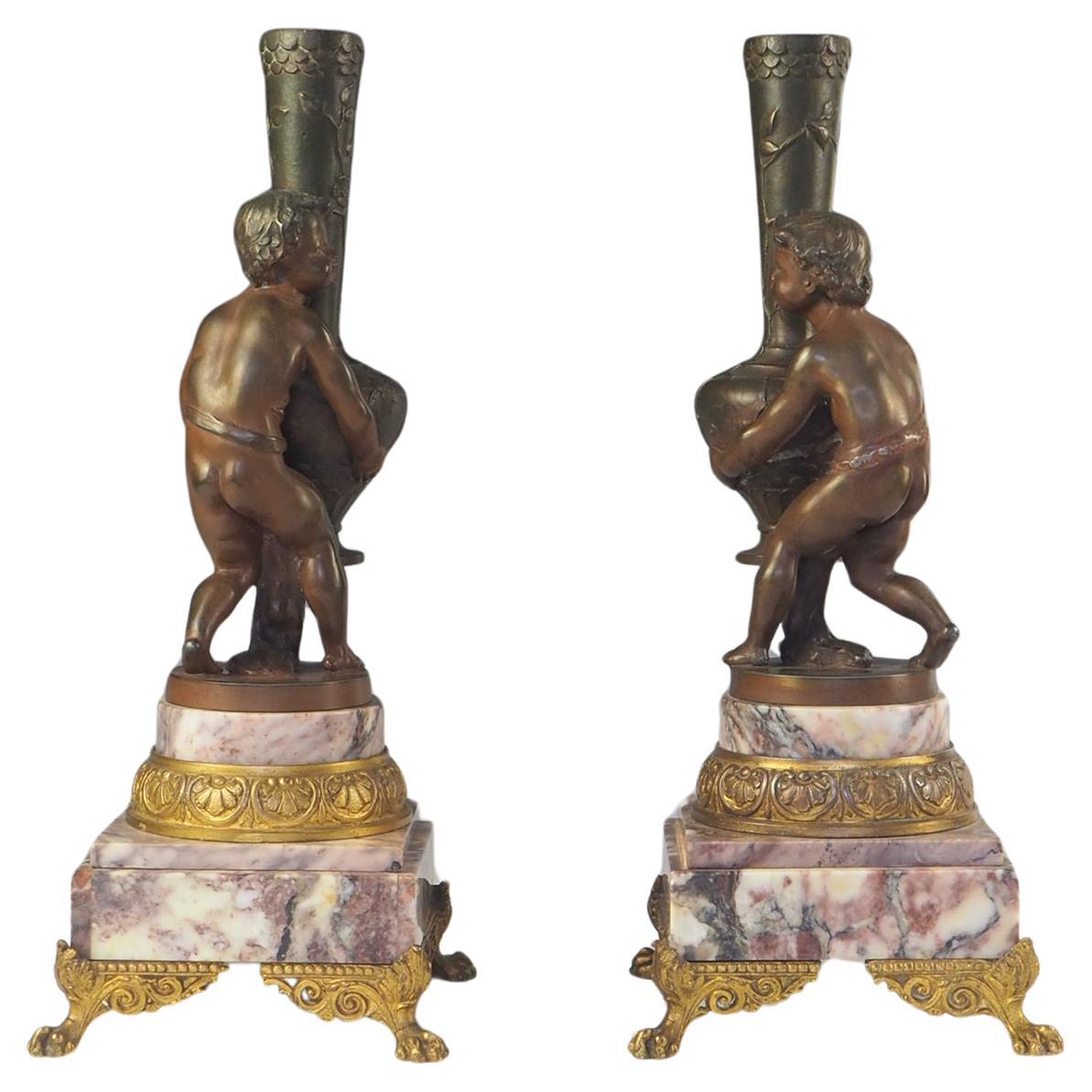 Coppia di vasi da fiori con cherubini "putti" francesi del XIX secolo