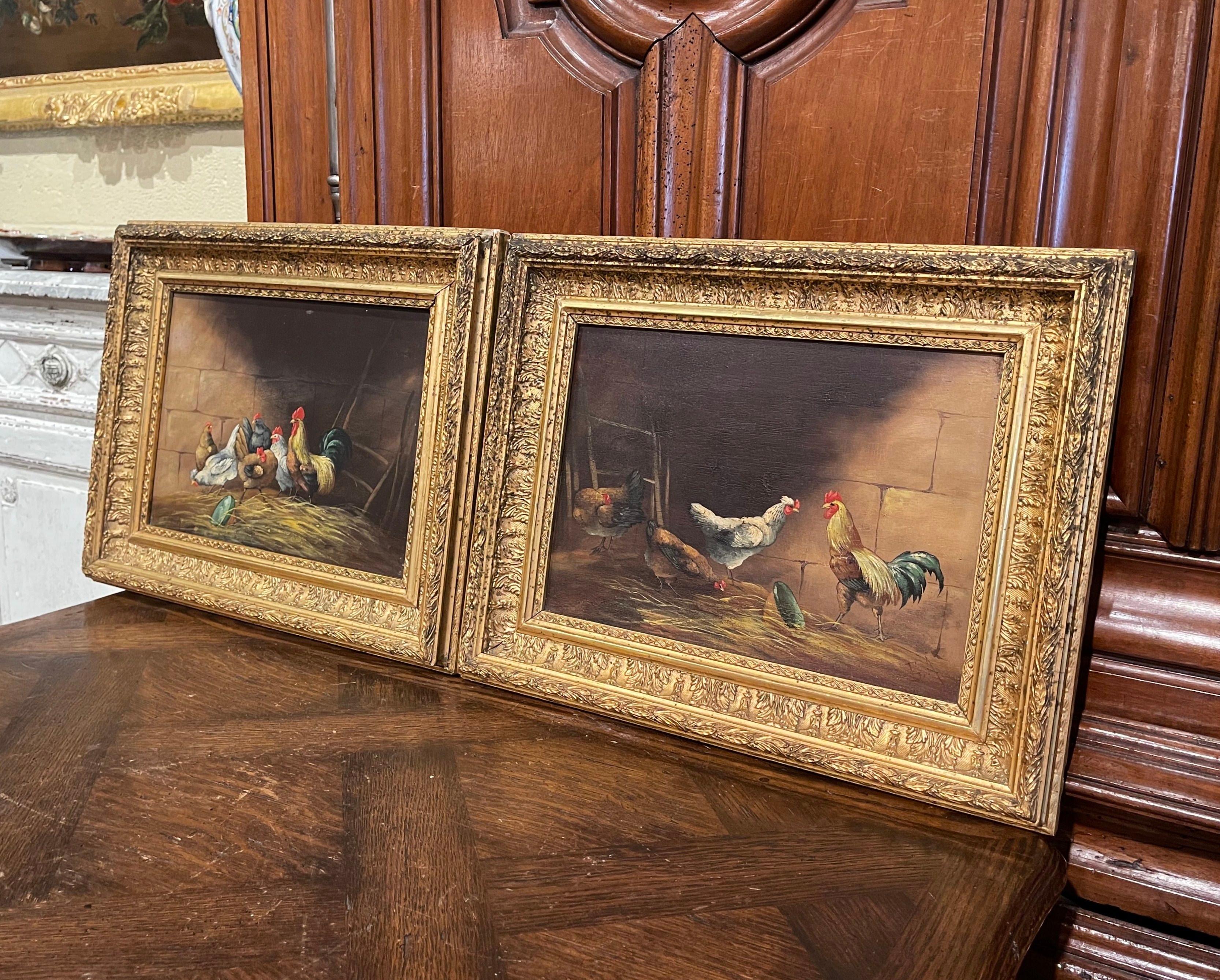 Crafted in France circa 1870 and set in the original gilt wood frame, each artwork painted on board features colorful numerous chicken grazing in a farm yard. Both artworks are signed by the artist 