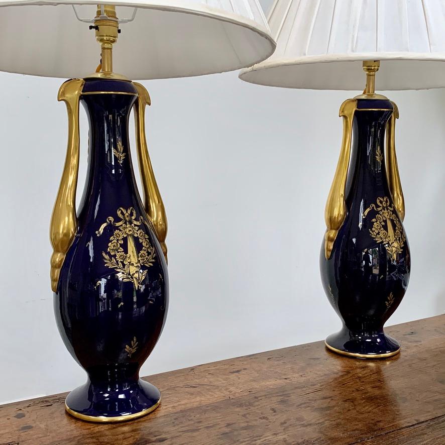 Fabulous pair of very decorative cobalt blue and gilded table lamps, converted from a pair of original vases.
These are a very striking pair of lamps and in super condition, the rich cobalt blue and gold are a beautiful combination. They are