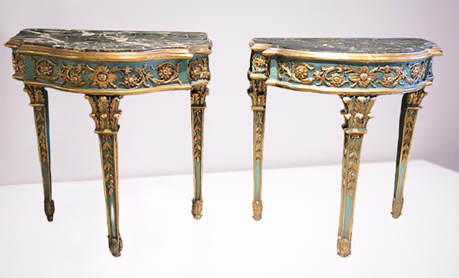 Pair of 19th century French console tables. A magnificent compatible pair of parcel-gilt and painted marble-top console or sofa tables that are simply stunning. The fine pair of carved gilt decorated side tables have the best workmanship anyone