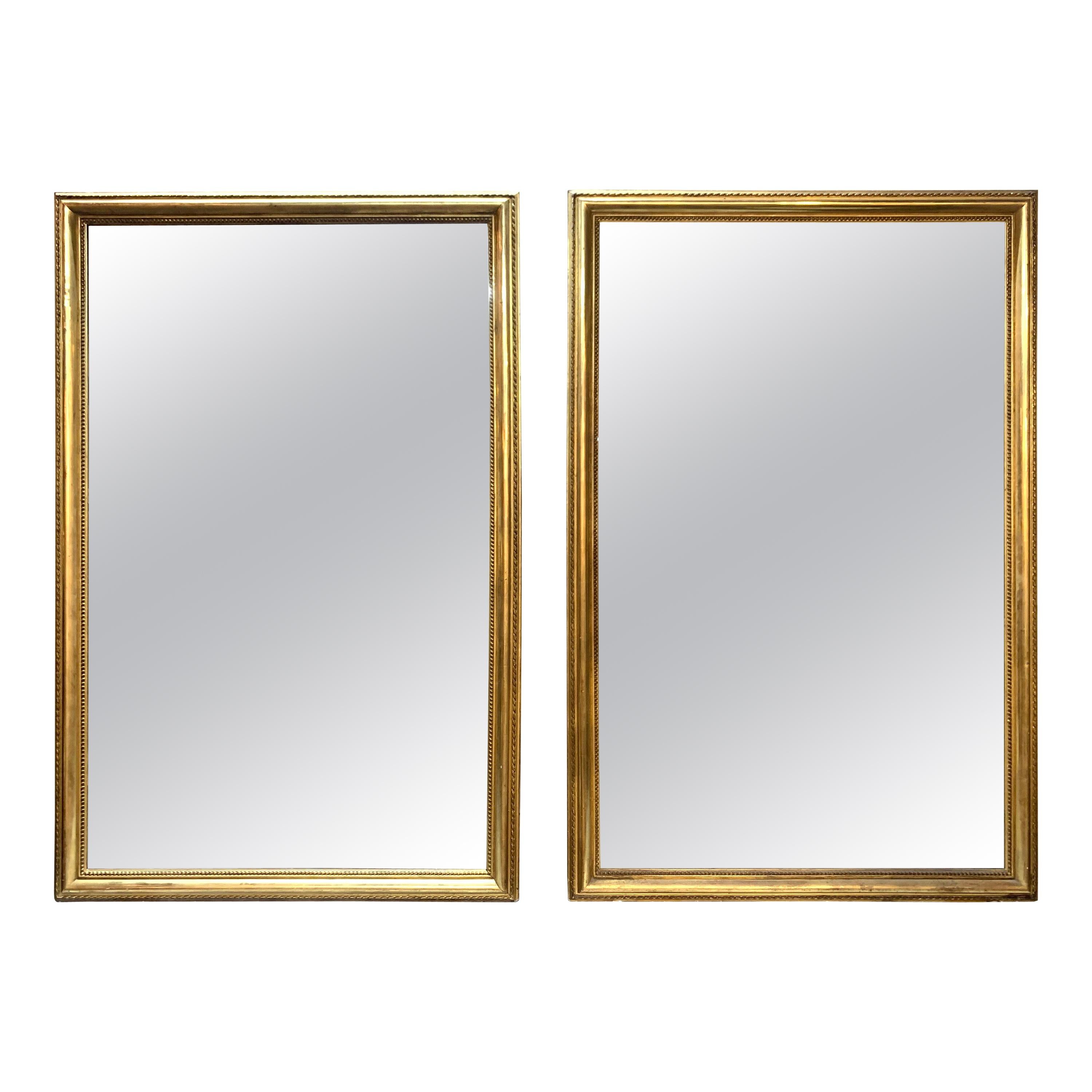 Pair of 19th Century French Directoire Style Giltwood Mirrors