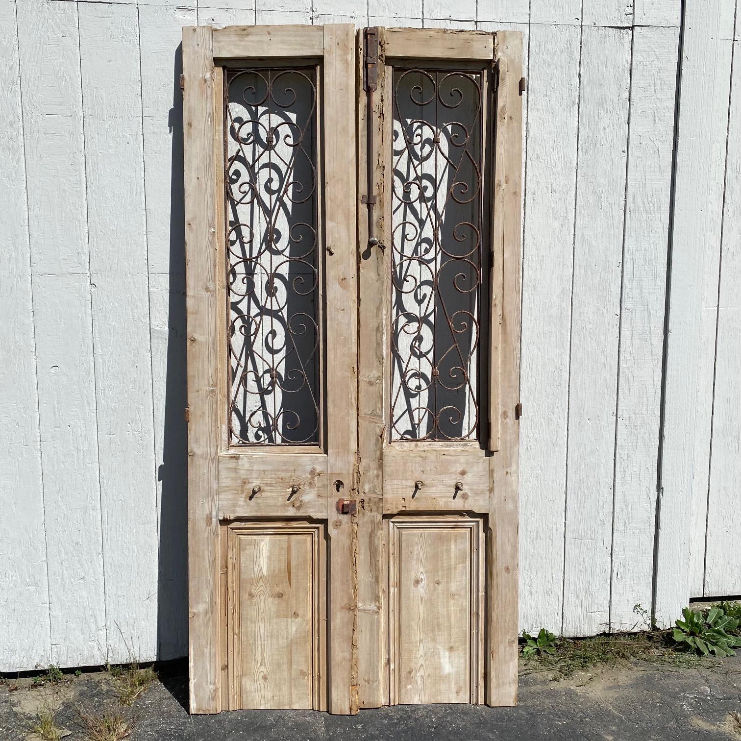 Pair of 19th Century French Doors with Curved Wrought Iron Panels For Sale 3