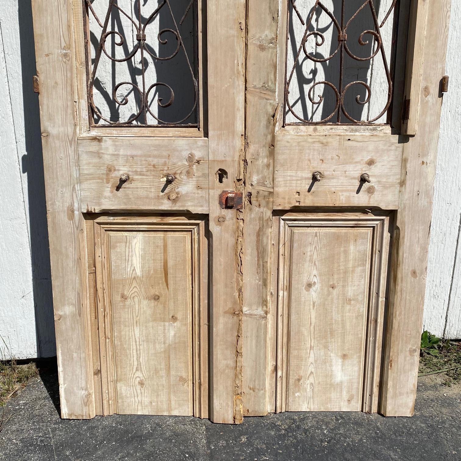 Pair of 19th Century French Doors with Curved Wrought Iron Panels For Sale 4