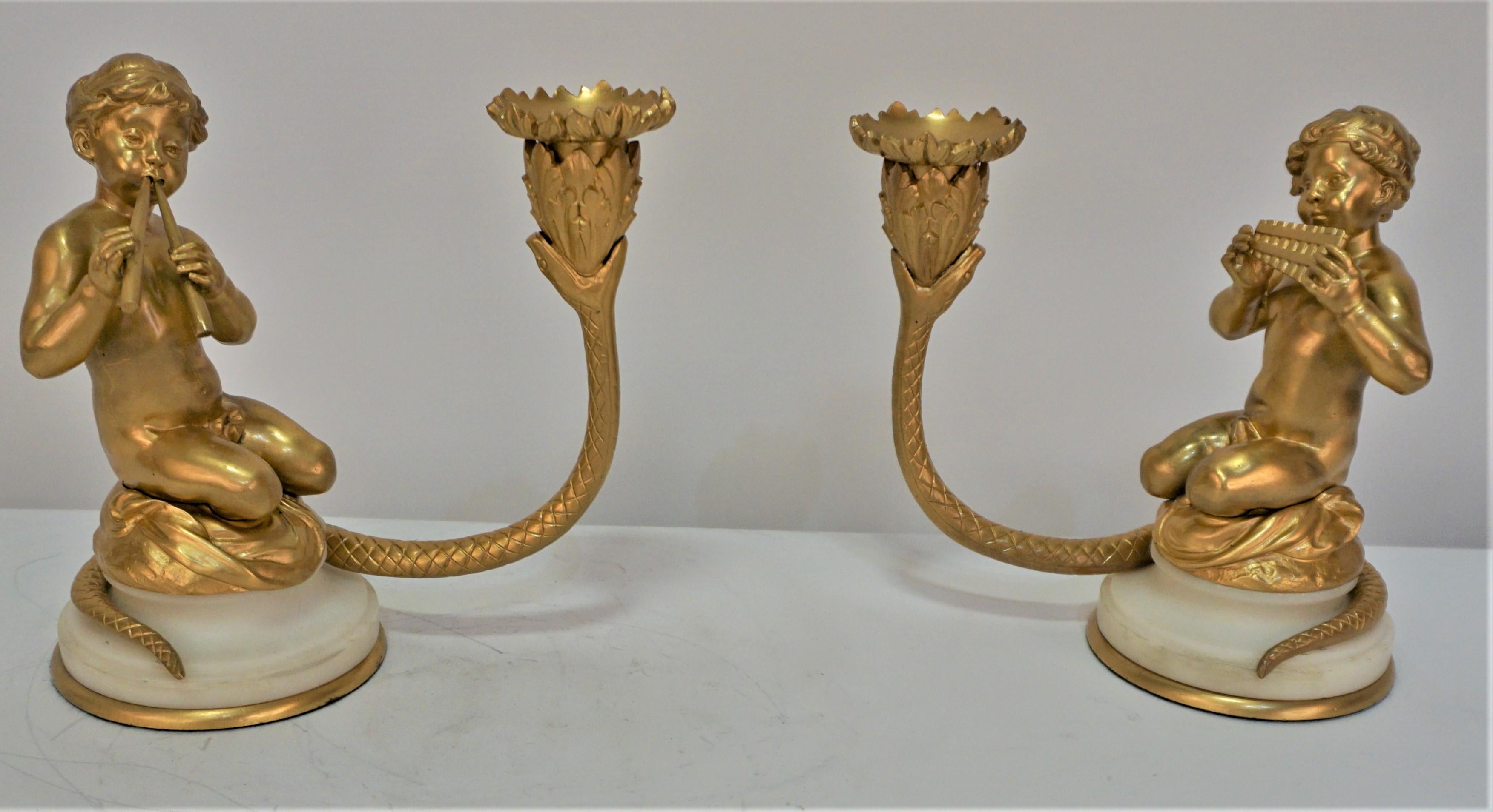 Rare pair of 19th century Dore bronze and marble candlesticks.