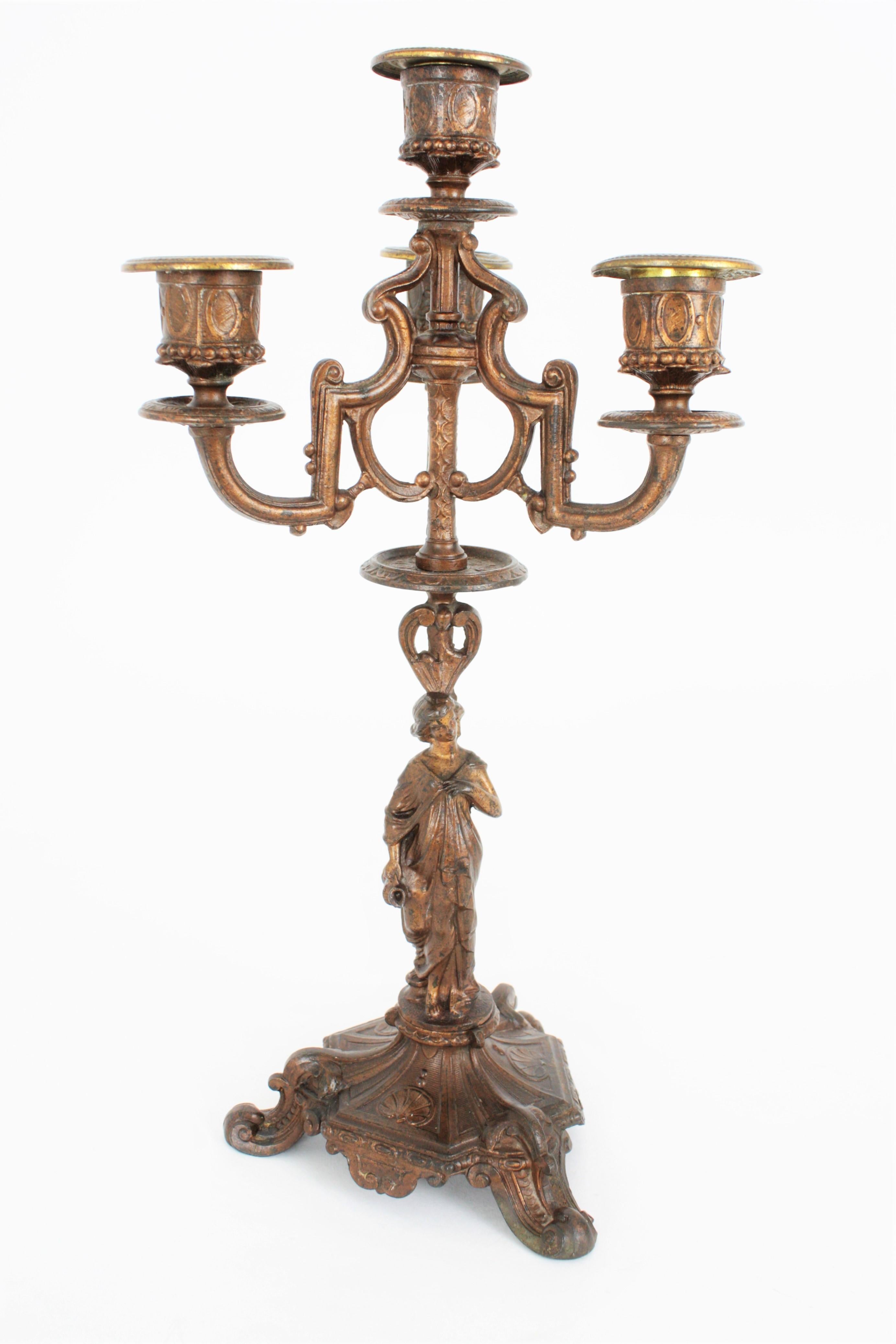 Pair of 19th century French Empire patinated bronze figural four-light candelabra, France, circa 1880.
Marked on the base: 446 LSF.
Priced and on sale individually.