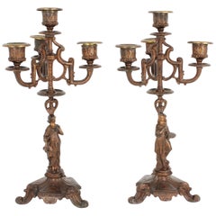 Two 19th Century French Empire Figural Cast Bronze Candelabra Two 19th Century French Empire Figural Cast Bronze Candelabra