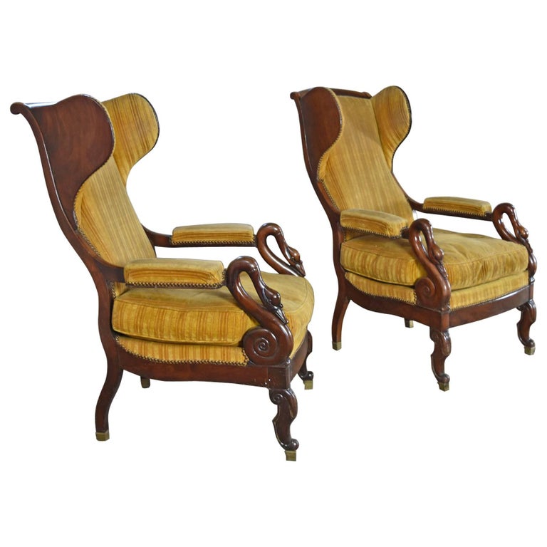 Pair of 19th Century French Empire Mahogany Wing-Back Armchairs For Sale