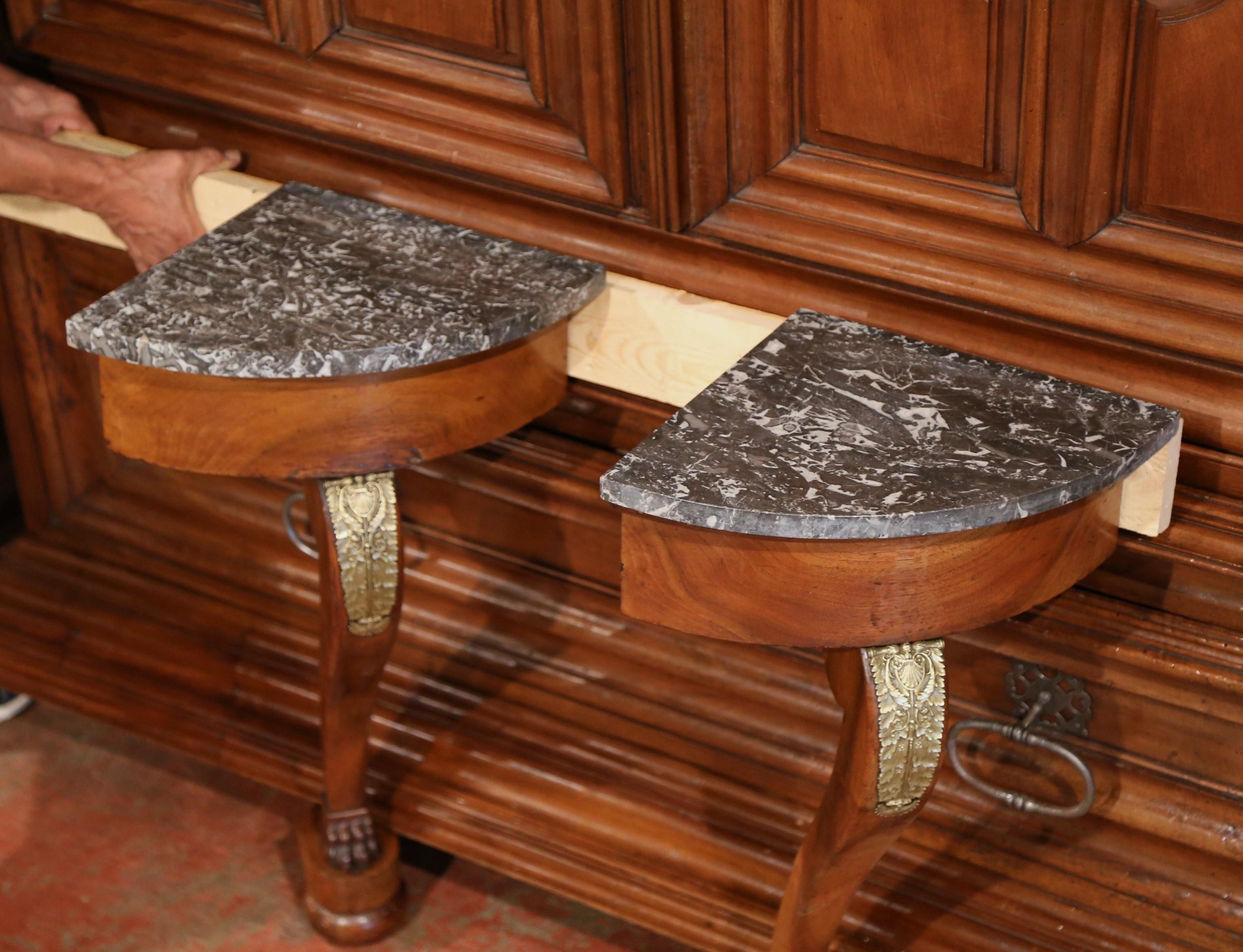 Hand-Carved Pair of 19th Century French Empire Walnut Corner Consoles with Grey Marble Top For Sale