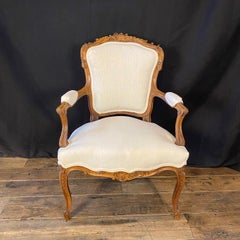 Pair of 19th Century French Exquisitely Carved Louis XV Arm Chairs
