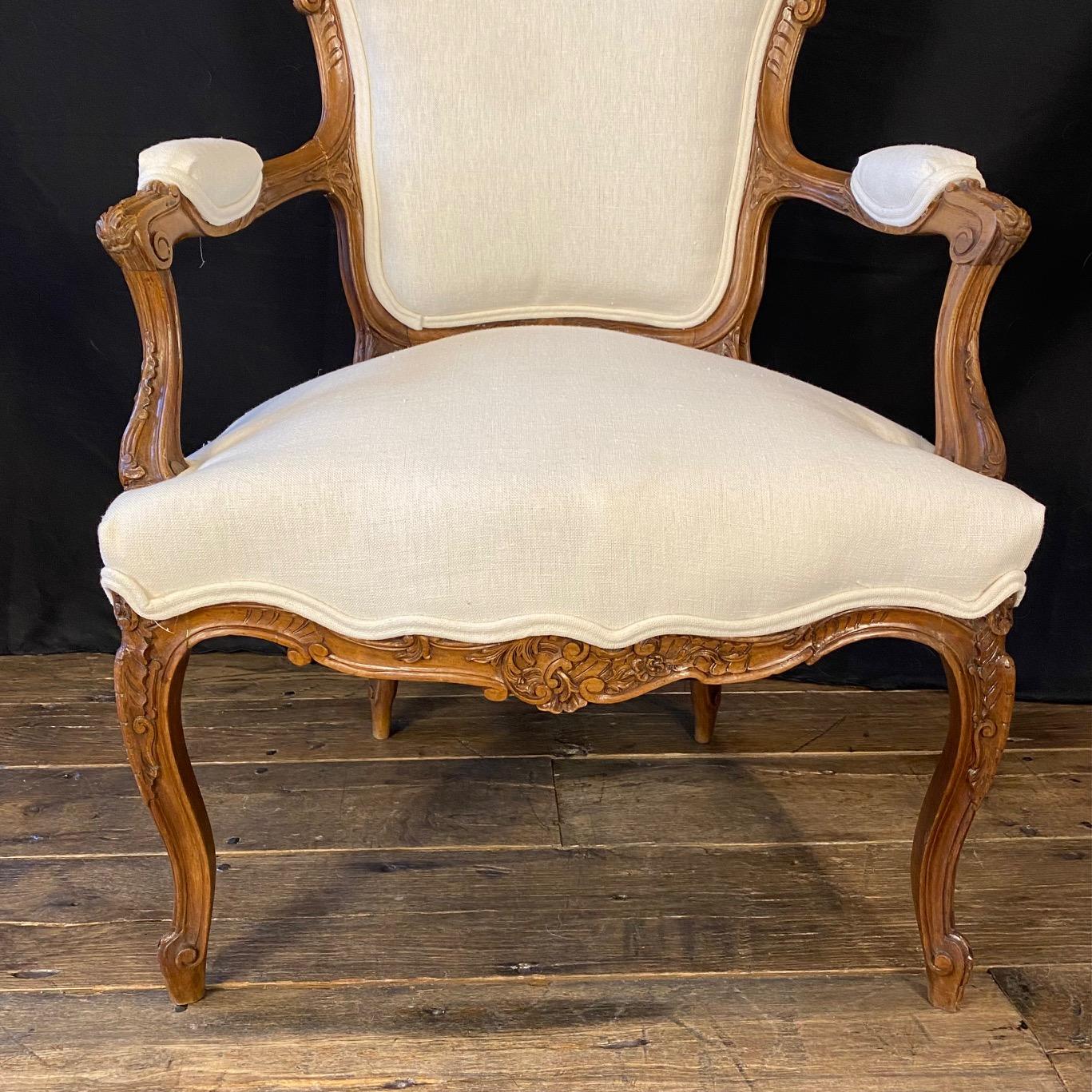 Pair of 19th Century French Exquisitely Carved Louis XV Arm Chairs In Good Condition For Sale In Hopewell, NJ