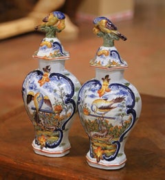 Pair of 19th Century French Faience Bottles with Figural Bird Stoppers