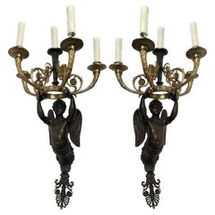 Pair of 19th Century French Gilt and Bronze Figural Sconces