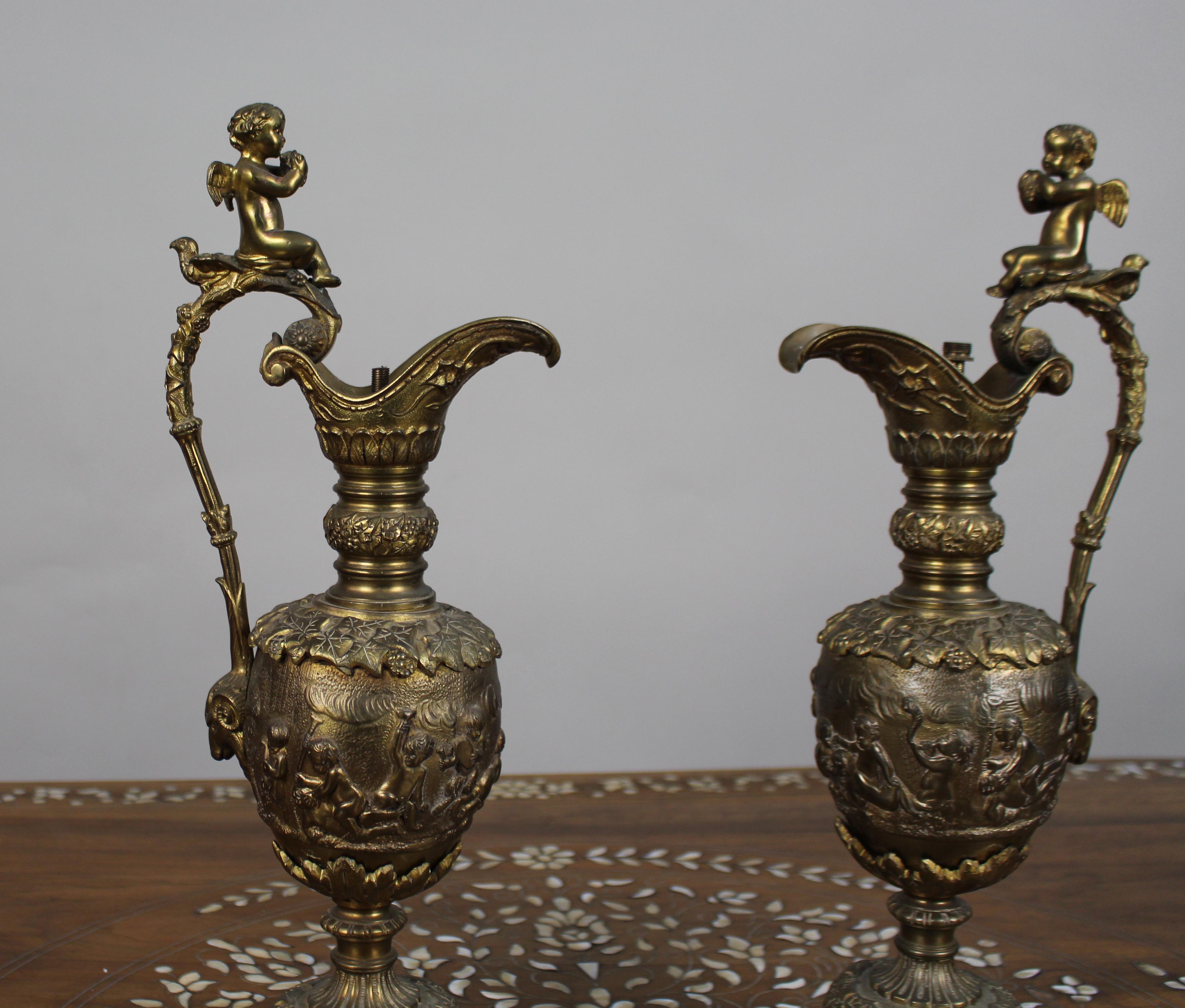 Pair of 19th Century French Gilt Bronze Bacchanalian Ewers with Cherubs In Good Condition For Sale In Worcester, GB
