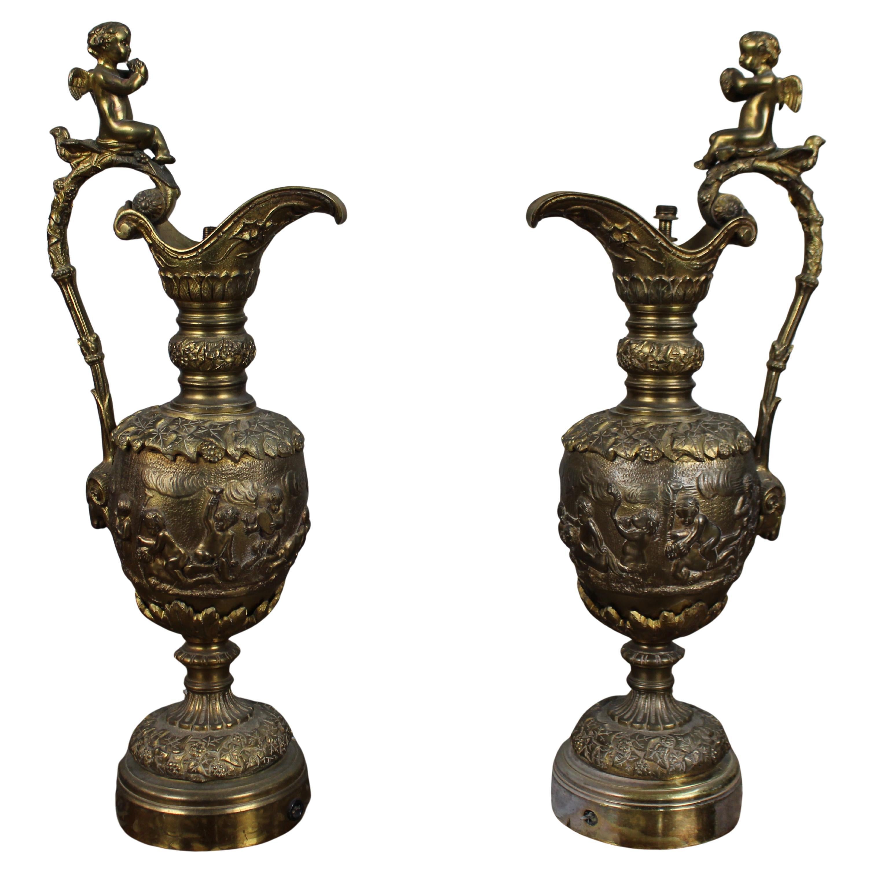 Pair of 19th Century French Gilt Bronze Bacchanalian Ewers with Cherubs For Sale