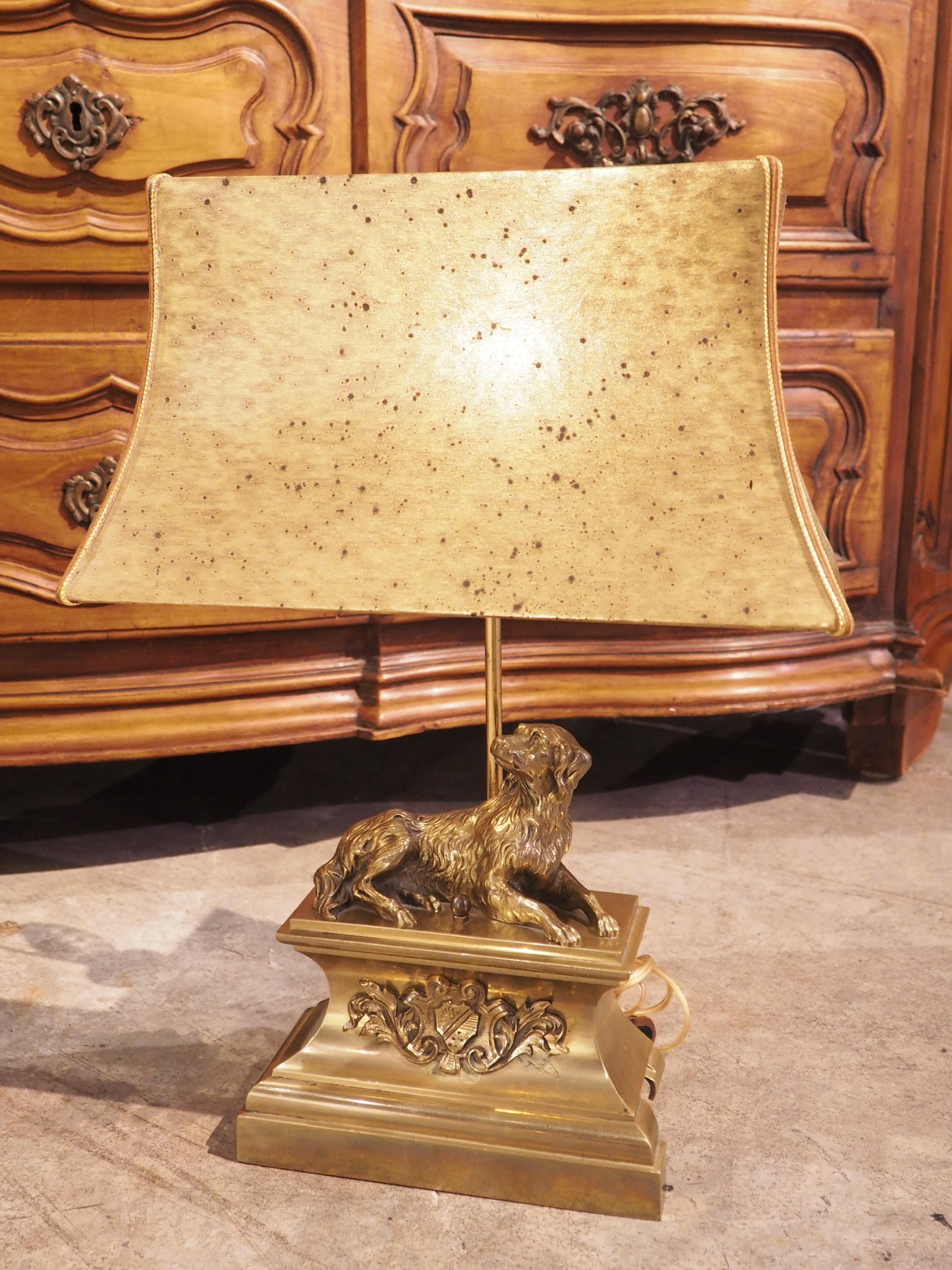 Originally part of a 19th century bar de cheminee, these gilt bronze dogs have been repurposed into a pair of table lamps. Sometimes referred to as a “hearth fender”, a bar de cheminee was a decorative element placed in front of a fireplace that