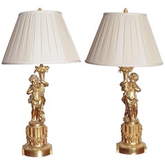 Pair of 19th Century French Gilt Bronze Large Cherub Lamps