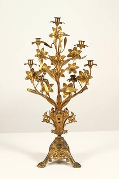 Pareja de candelabros franceses de metal dorado del siglo XIX