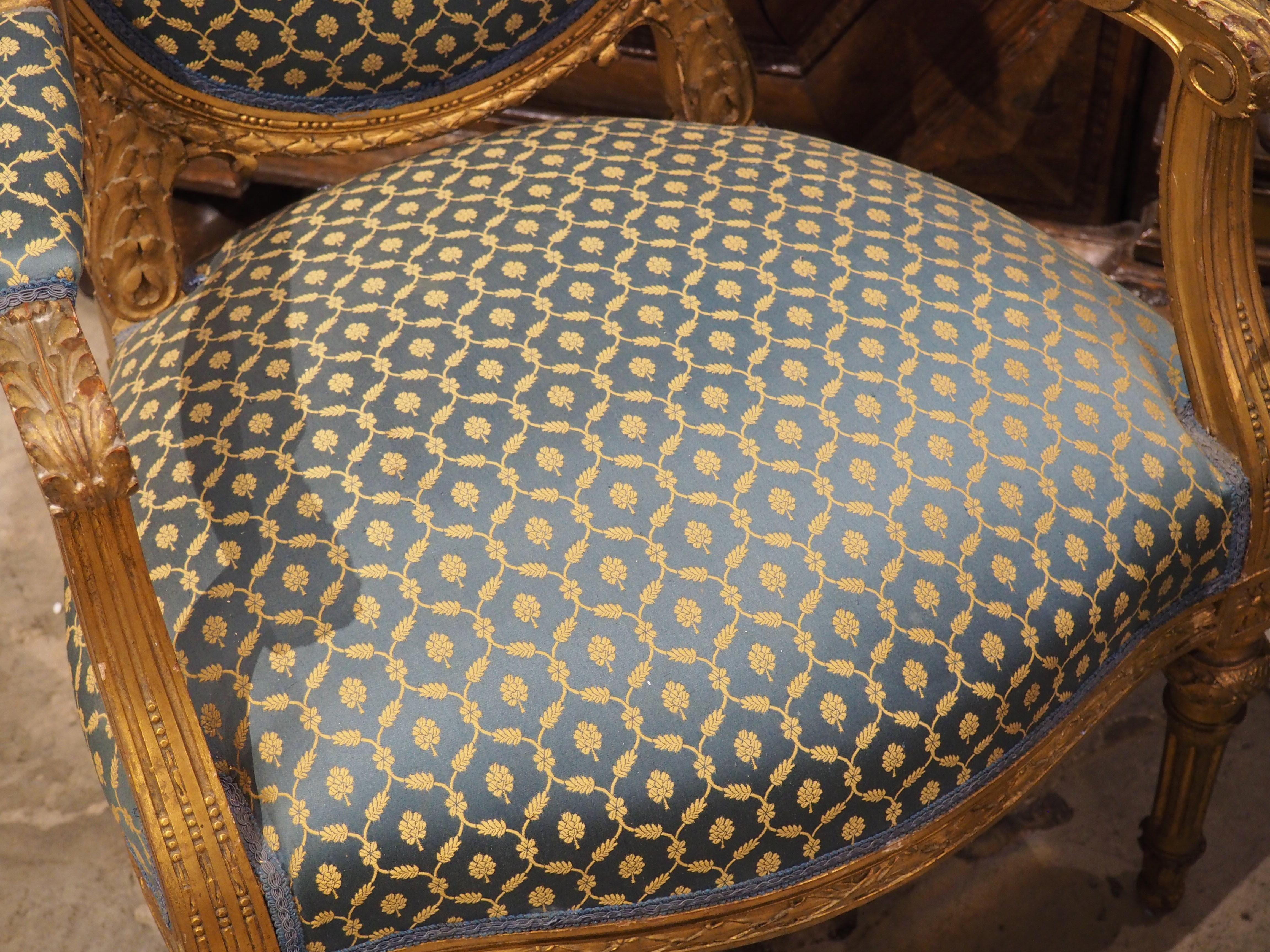 Upholstery Pair of 19th Century French Giltwood Louis XVI Style Médaillon Armchairs For Sale