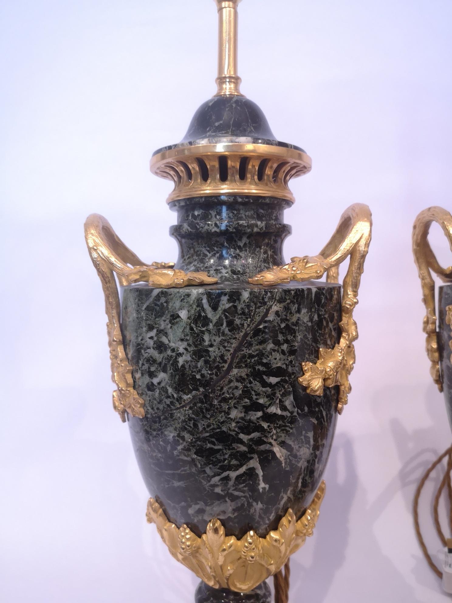 European Pair Of 19th Century French Green Marble And Gilt Bronze Lamps For Sale