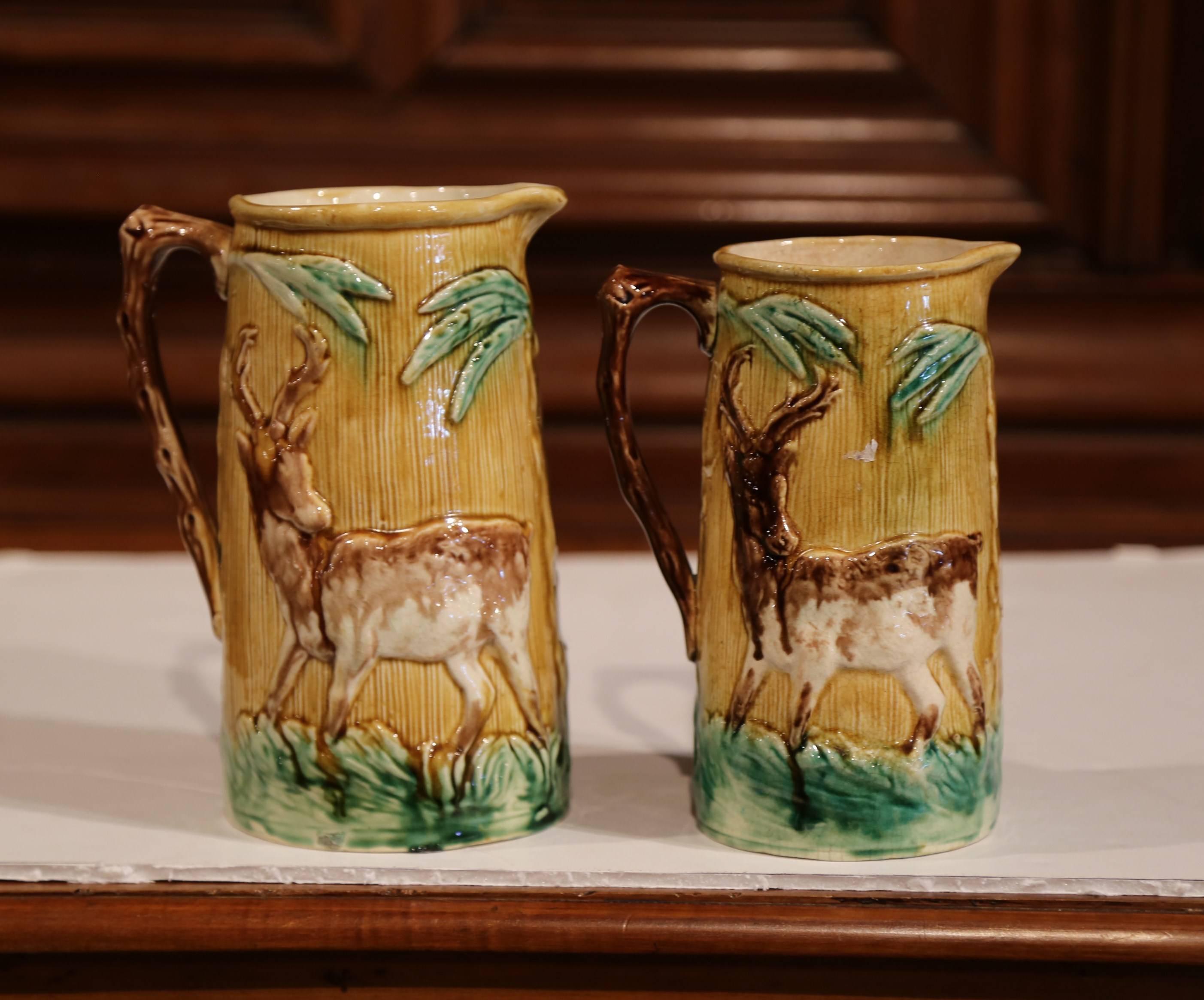 Pair of 19th Century French Hand-Painted Barbotine Wine Pitchers with Deer 1