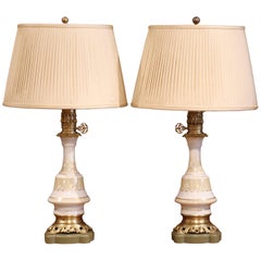 Pair of 19th Century French Hand-Painted Porcelain Oil Lamps with Brass Mounts