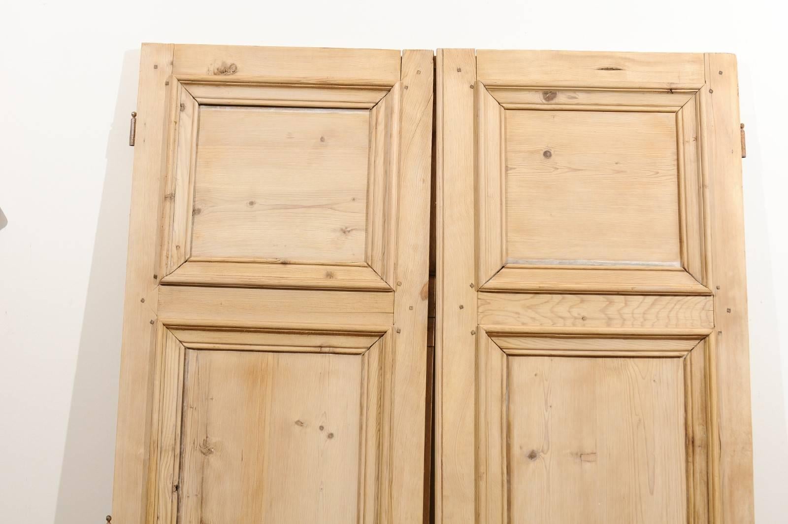Pair of 19th Century French Haussmannian Wooden Doors with Molded Panels 1