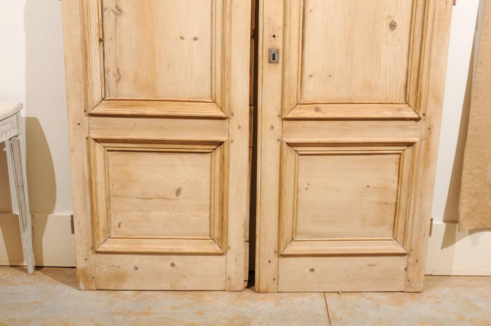 Pair of 19th Century French Haussmannian Wooden Doors with Molded Panels 4
