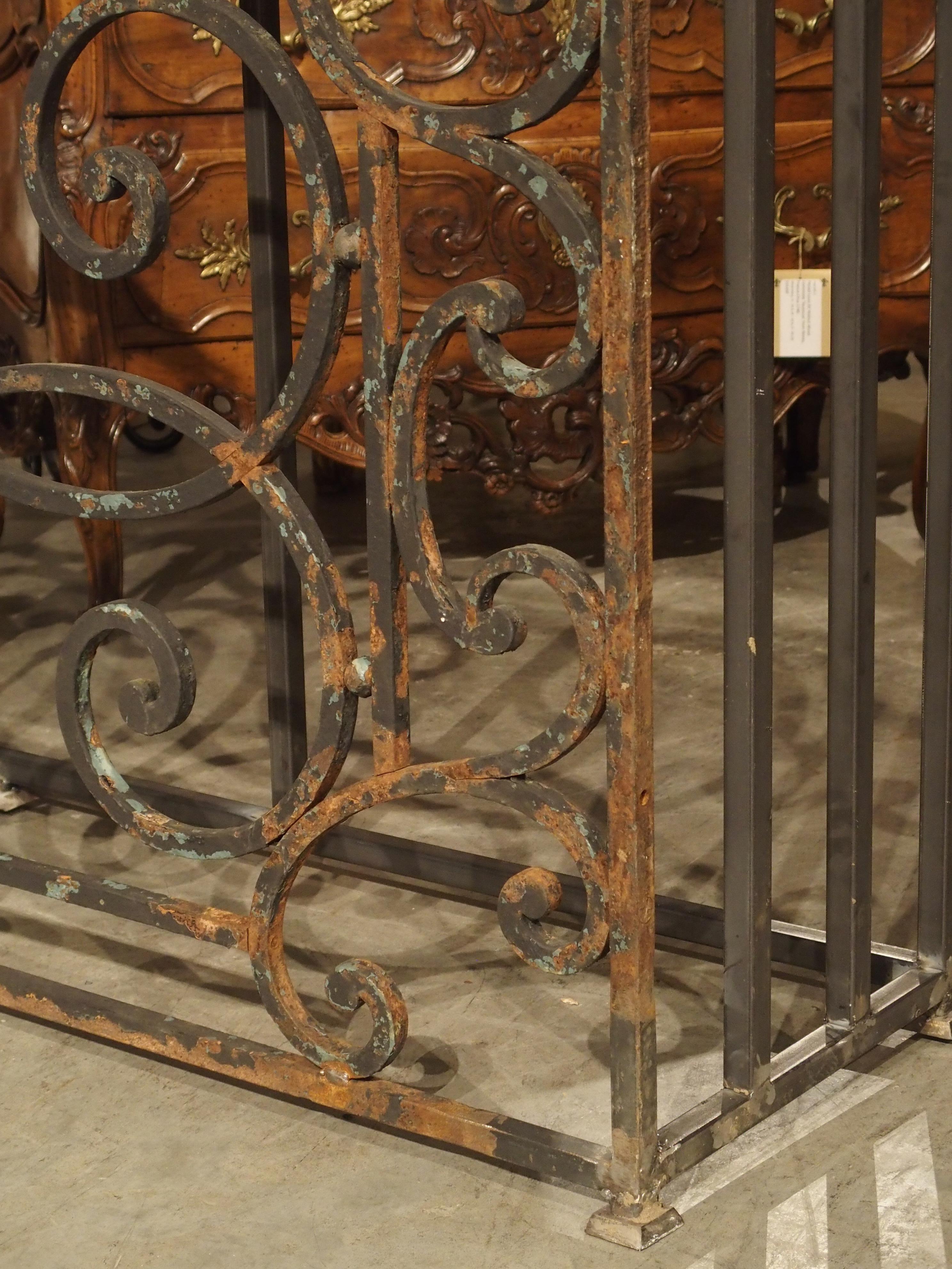 Hand-Carved Pair of 19th Century French Iron Balcony Gate Consoles with Bluestone Tops