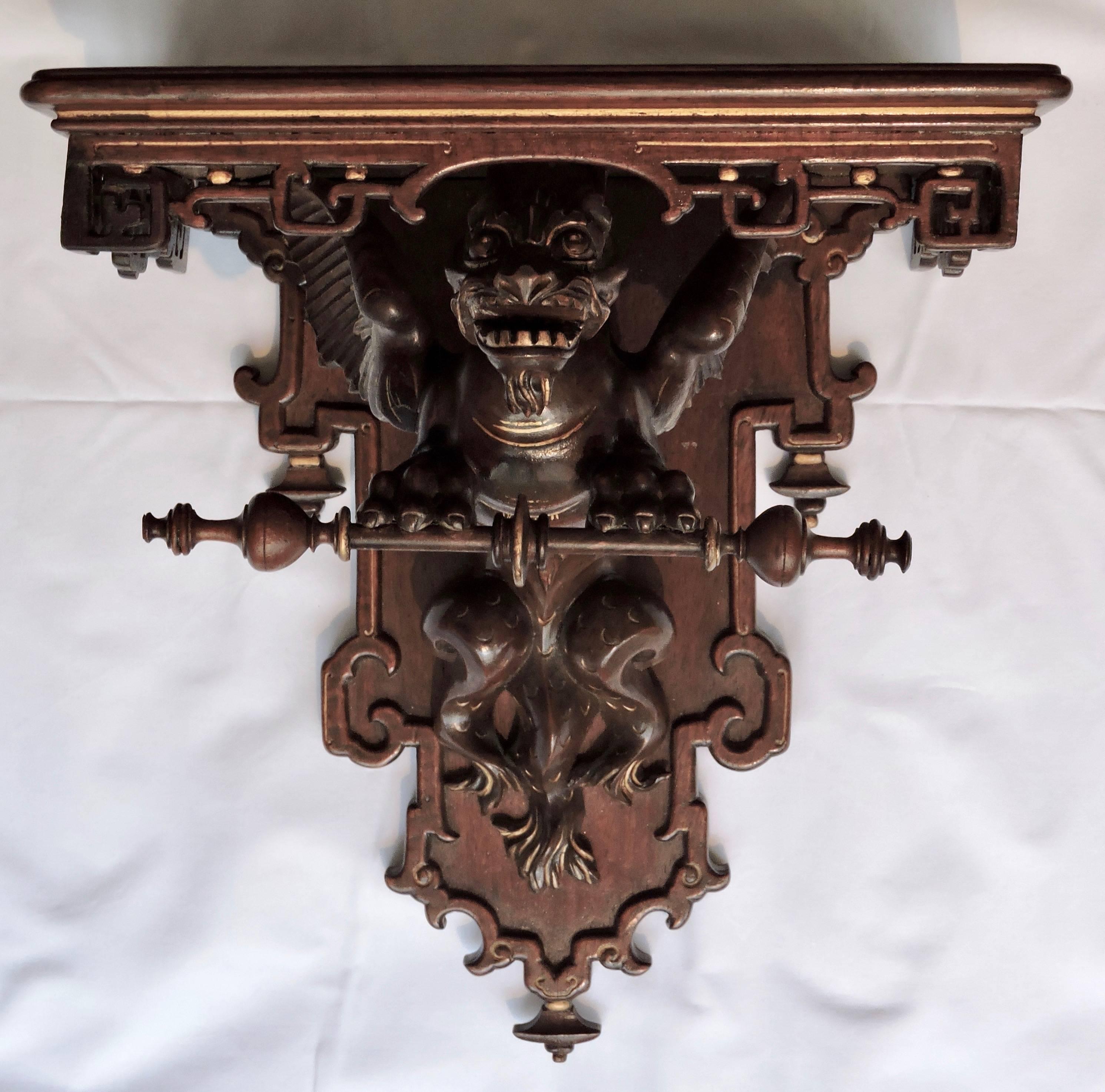 Pair of 19th century French Japonisme console style wall-brackets
Designed with a winged dragoon
Mahogany and gilt patinated
circa 1890.
   