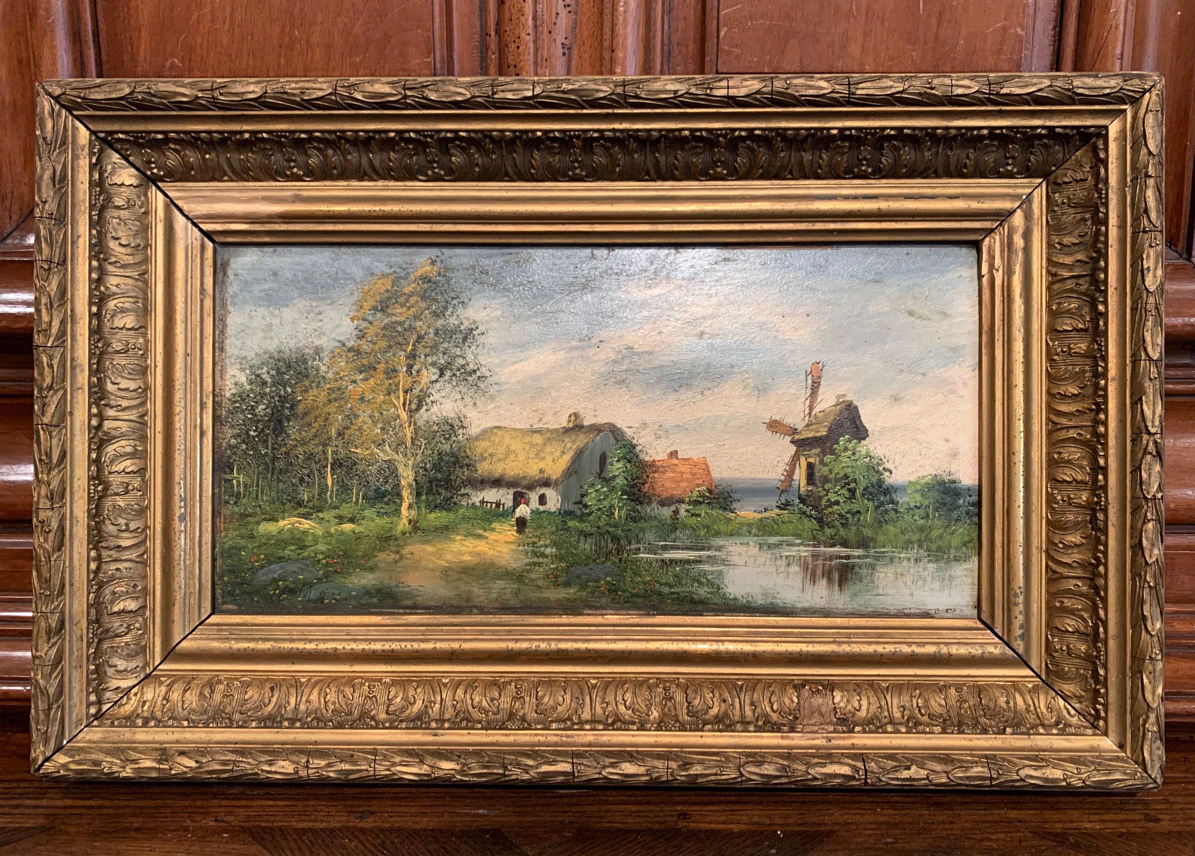 Decorate an office or a study with this elegant pair of colorful antique paintings; crafted in France circa 1880 and set in the original carved gilt wood frame, both artworks are done on board and feature beautiful landscapes with people, farmhouse,