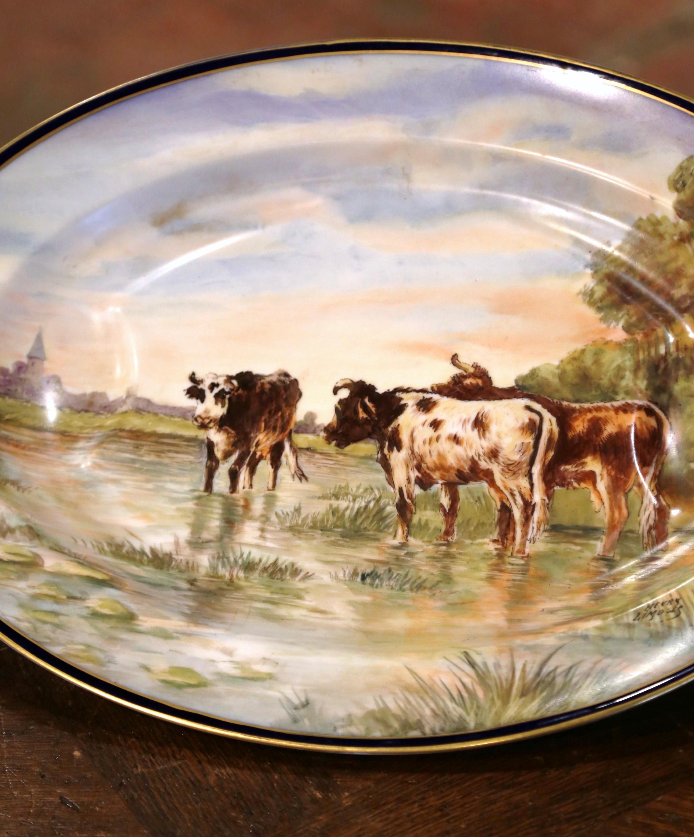 Pair of 19th Century French Limoges Painted Porcelain Cows Wall Platters In Excellent Condition For Sale In Dallas, TX