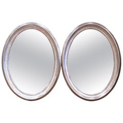 Antique Pair of 19th Century French Louis Philippe Carved Silver Leaf Oval Mirrors