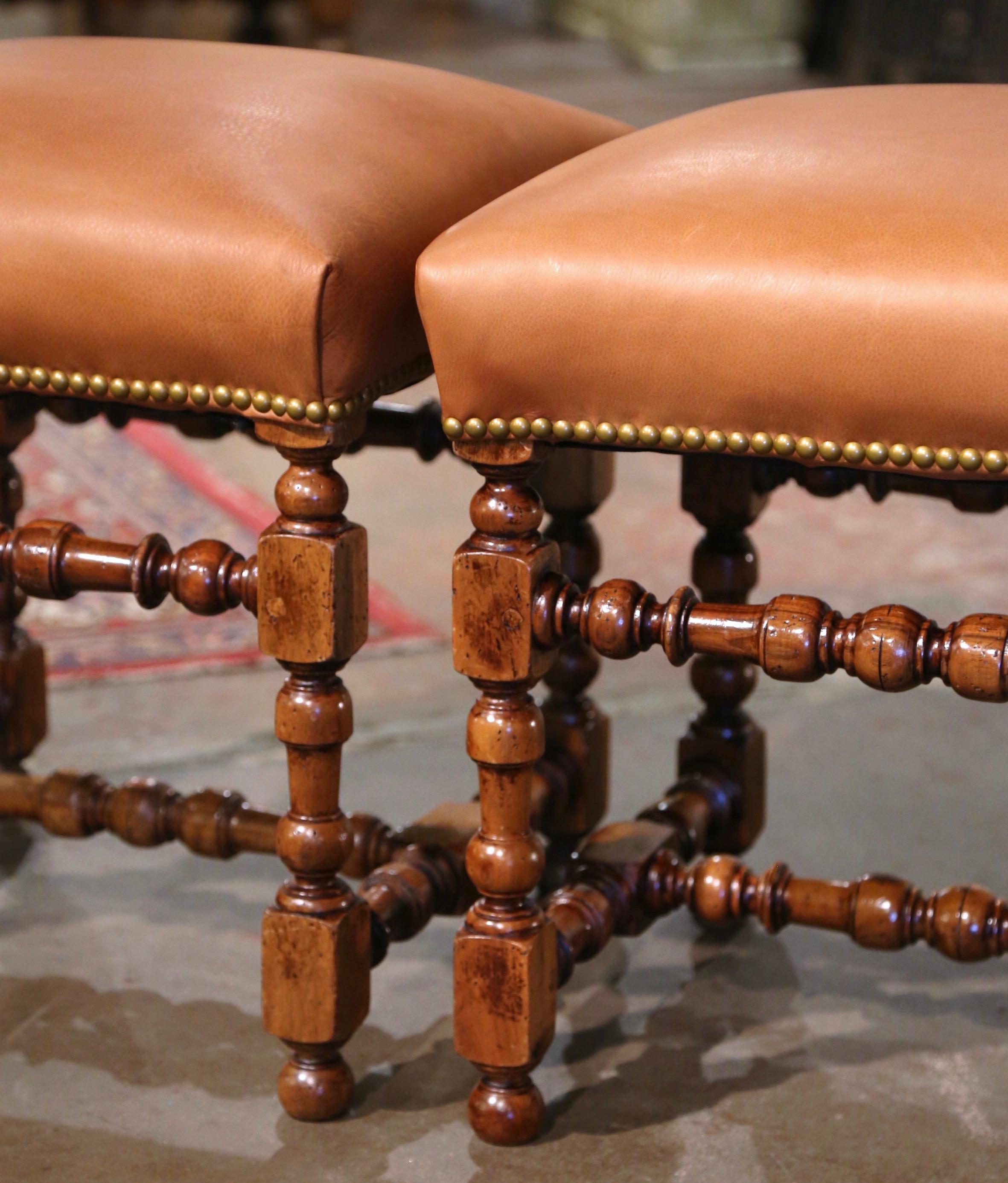 Pair of 19th Century French Louis XIII Carved Oak and Tan Leather Stools In Excellent Condition In Dallas, TX