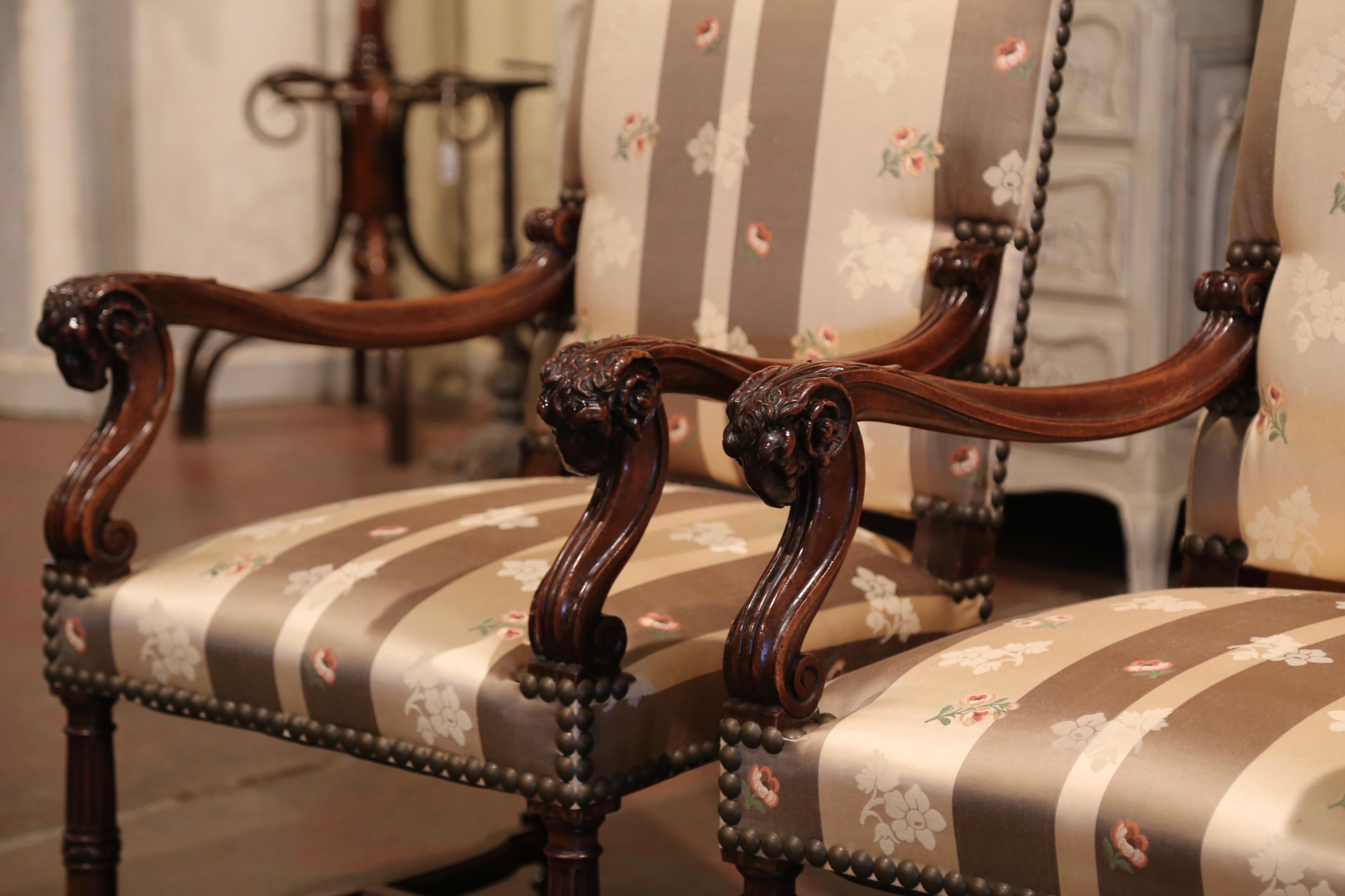 Hand-Carved Pair of 19th Century French Louis XIII Carved Walnut Armchairs with Ram Decor For Sale