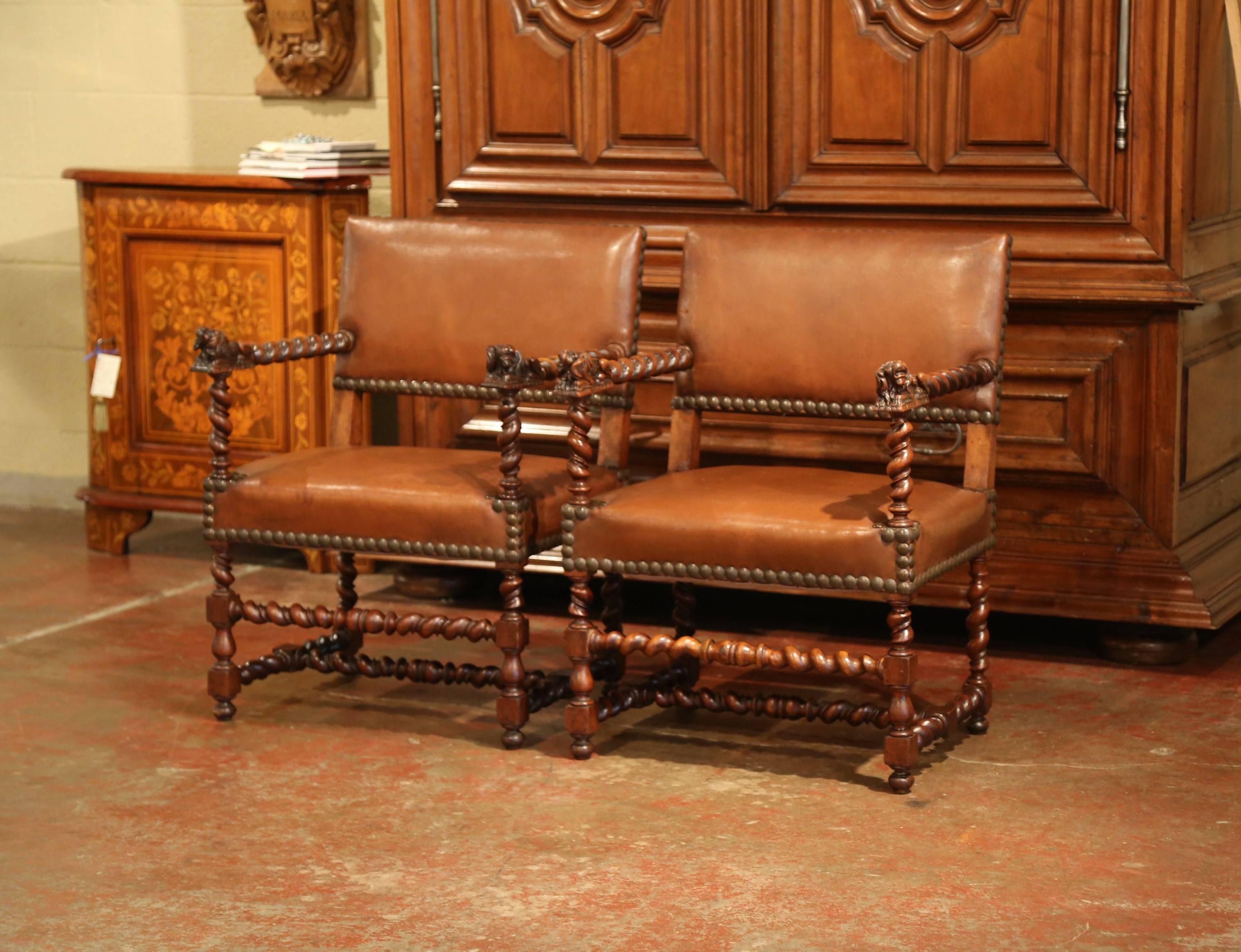 Hand-Carved Pair of 19th Century French Louis XIII Walnut and Leather Barley Twist Armchairs