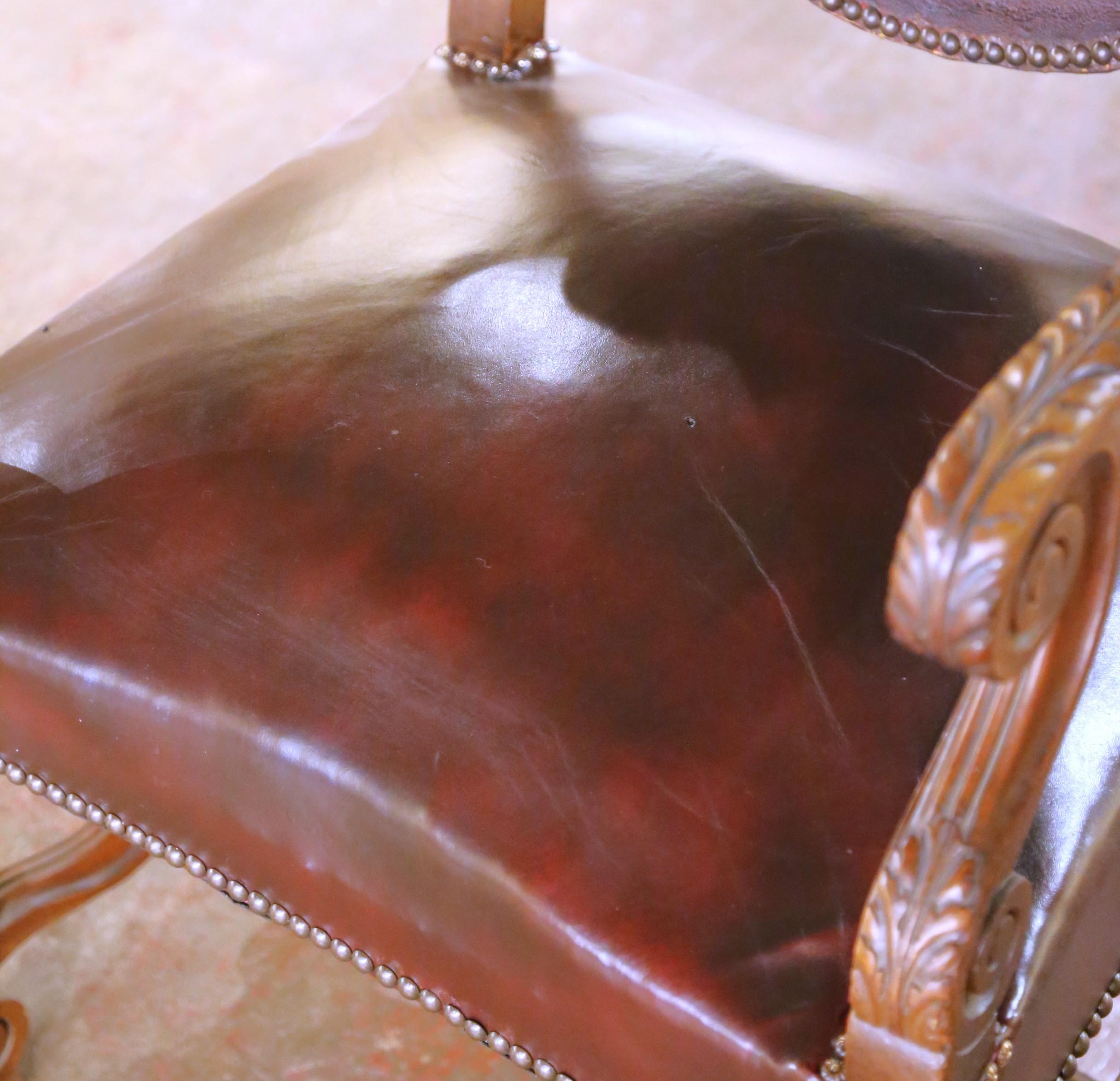 XIXe siècle Pair of 19th Century French Louis XIII Walnut Armchairs with Embossed Leather en vente