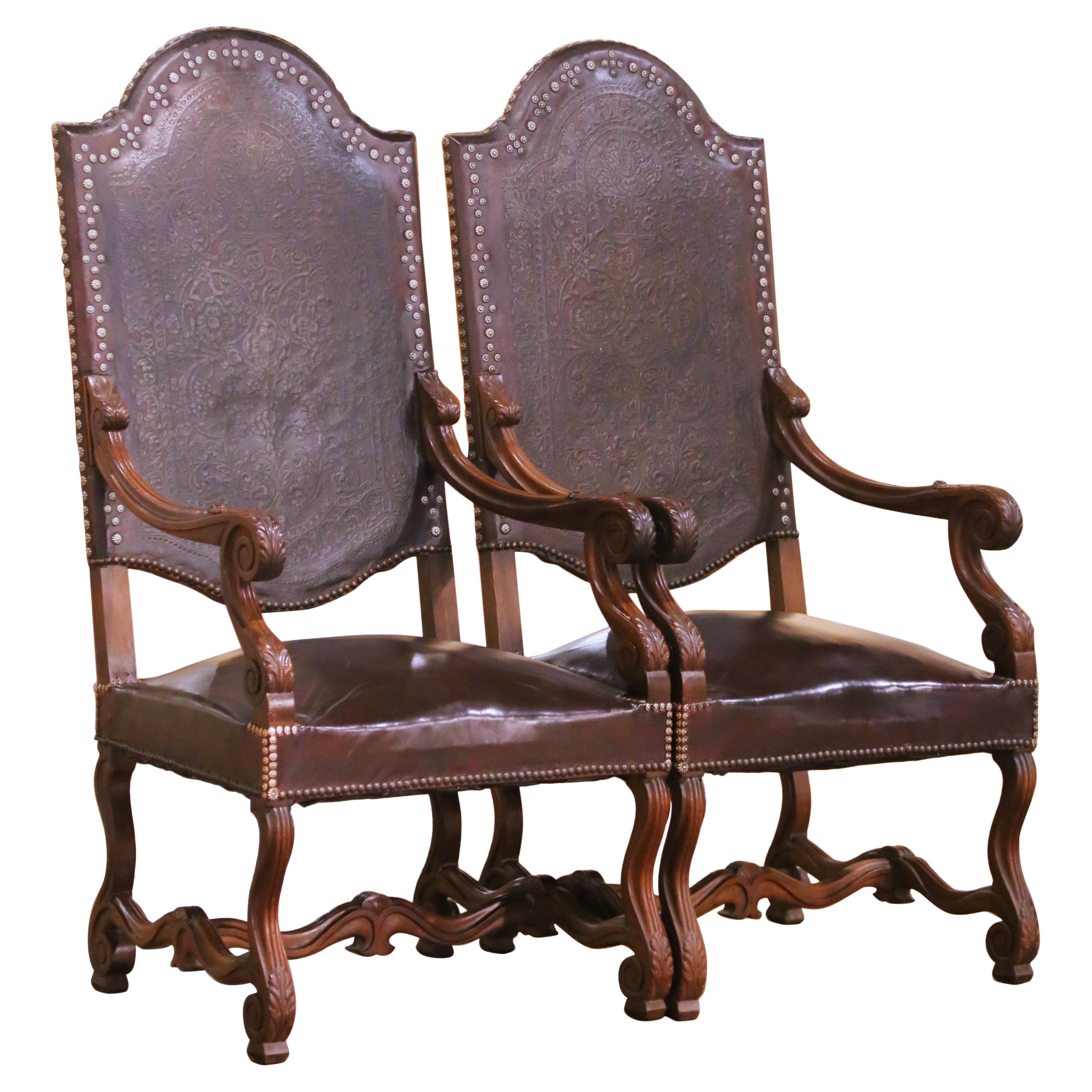 Pair of 19th Century French Louis XIII Walnut Armchairs with Embossed Leather