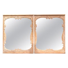 Paire de miroirs muraux en pin sculpté de style Louis XIV rococo du 19ème siècle français