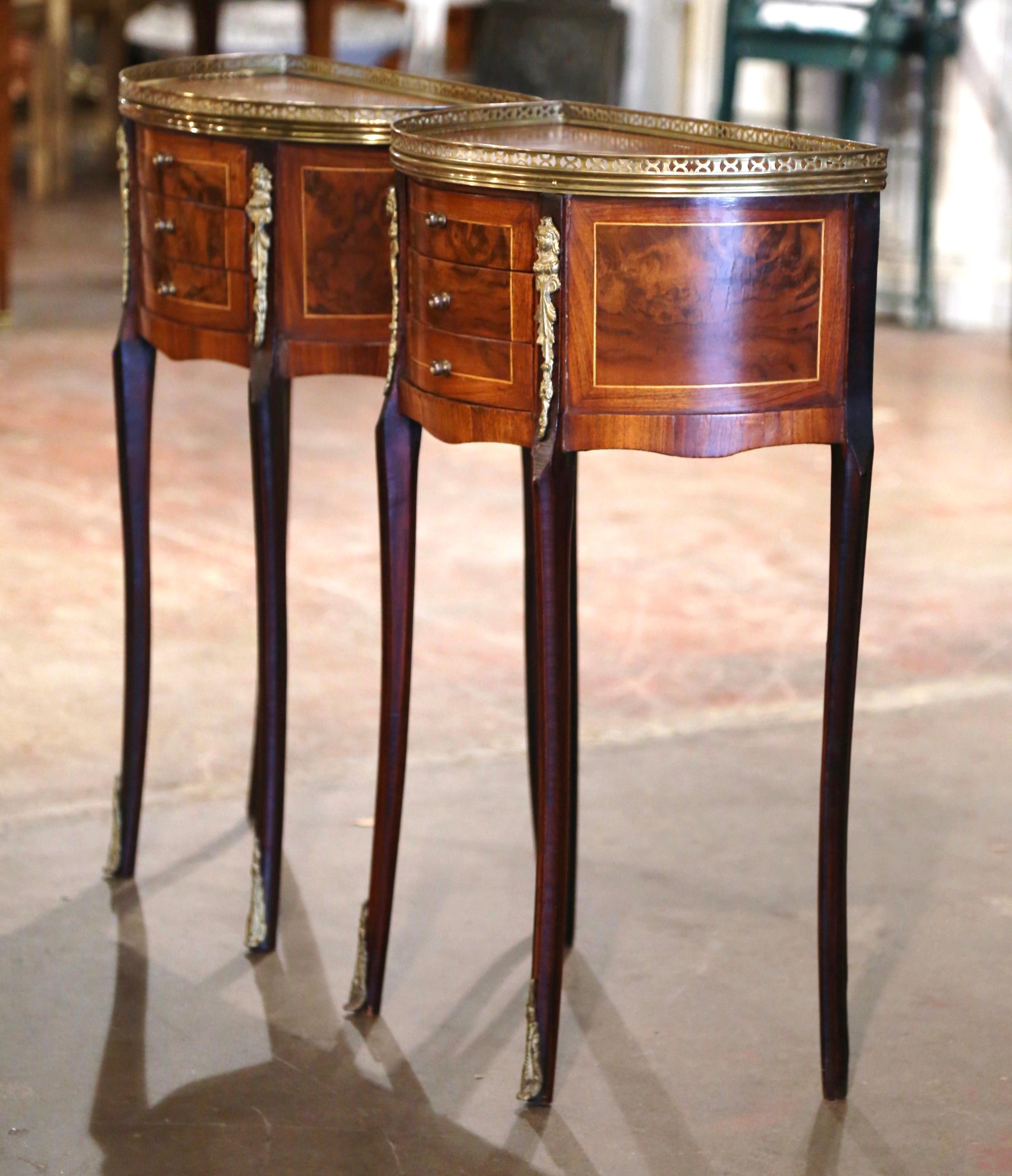 Place this elegant pair of chests on either side of a king side bed as nightstands, or use them as small side tables in a living room. Crafted in France circa 1880, each cabinet shaped a half moon stands on cabriole legs ending with brass sabot over