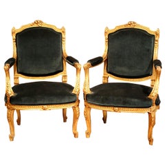 Pair of 19th Century French Louis XV Carved Giltwood Bergères with Green Velvet