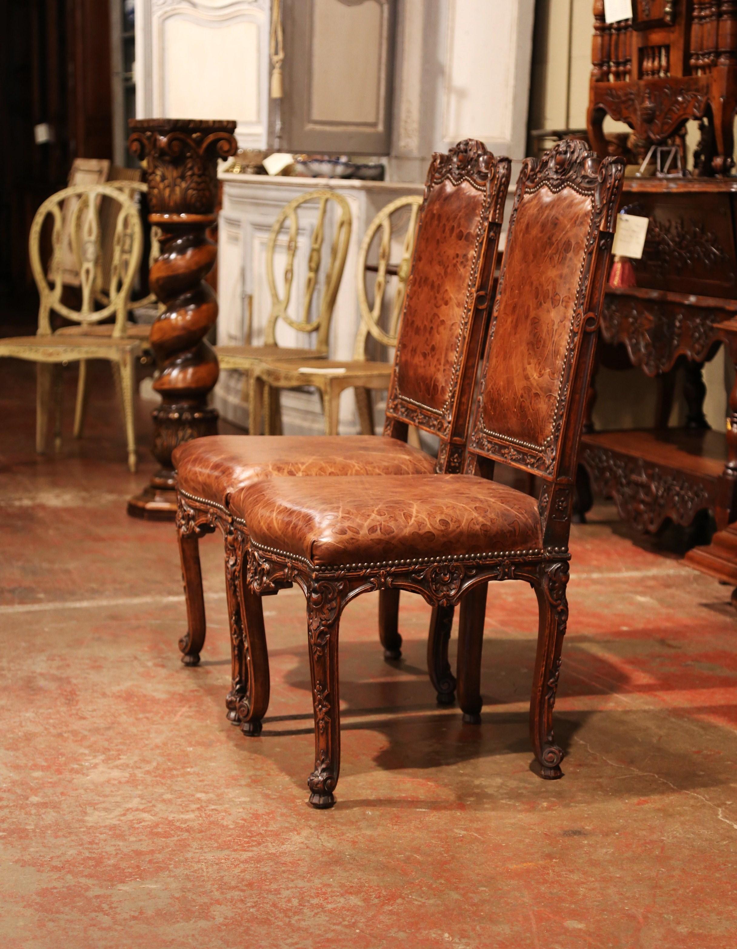 Hand-Carved Pair of 19th Century French Louis XV Carved Walnut Chairs with Embossed Leather