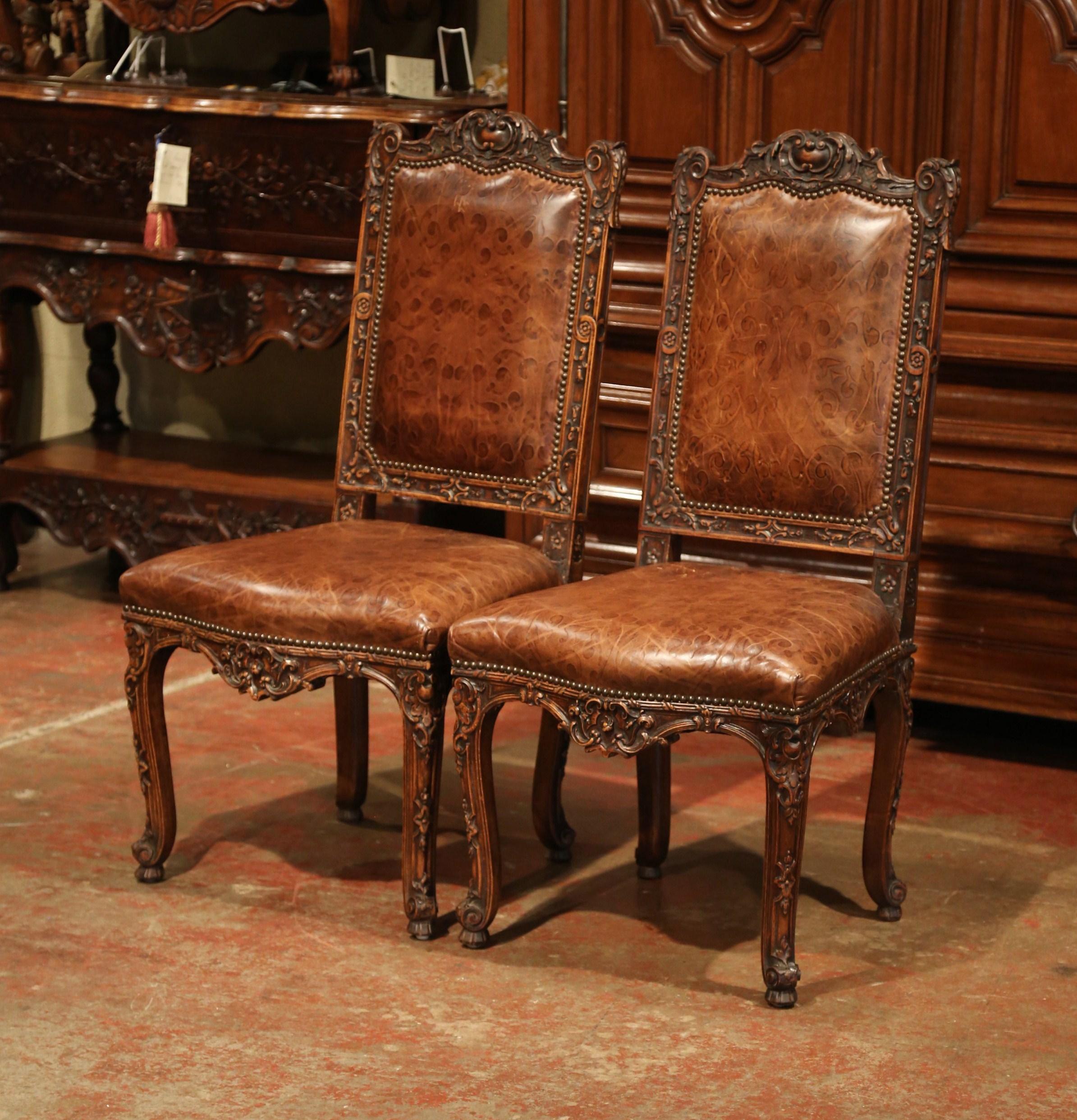 Pair of 19th Century French Louis XV Carved Walnut Chairs with Embossed Leather In Excellent Condition In Dallas, TX