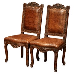 Pair of 19th Century French Louis XV Carved Walnut Chairs with Embossed Leather