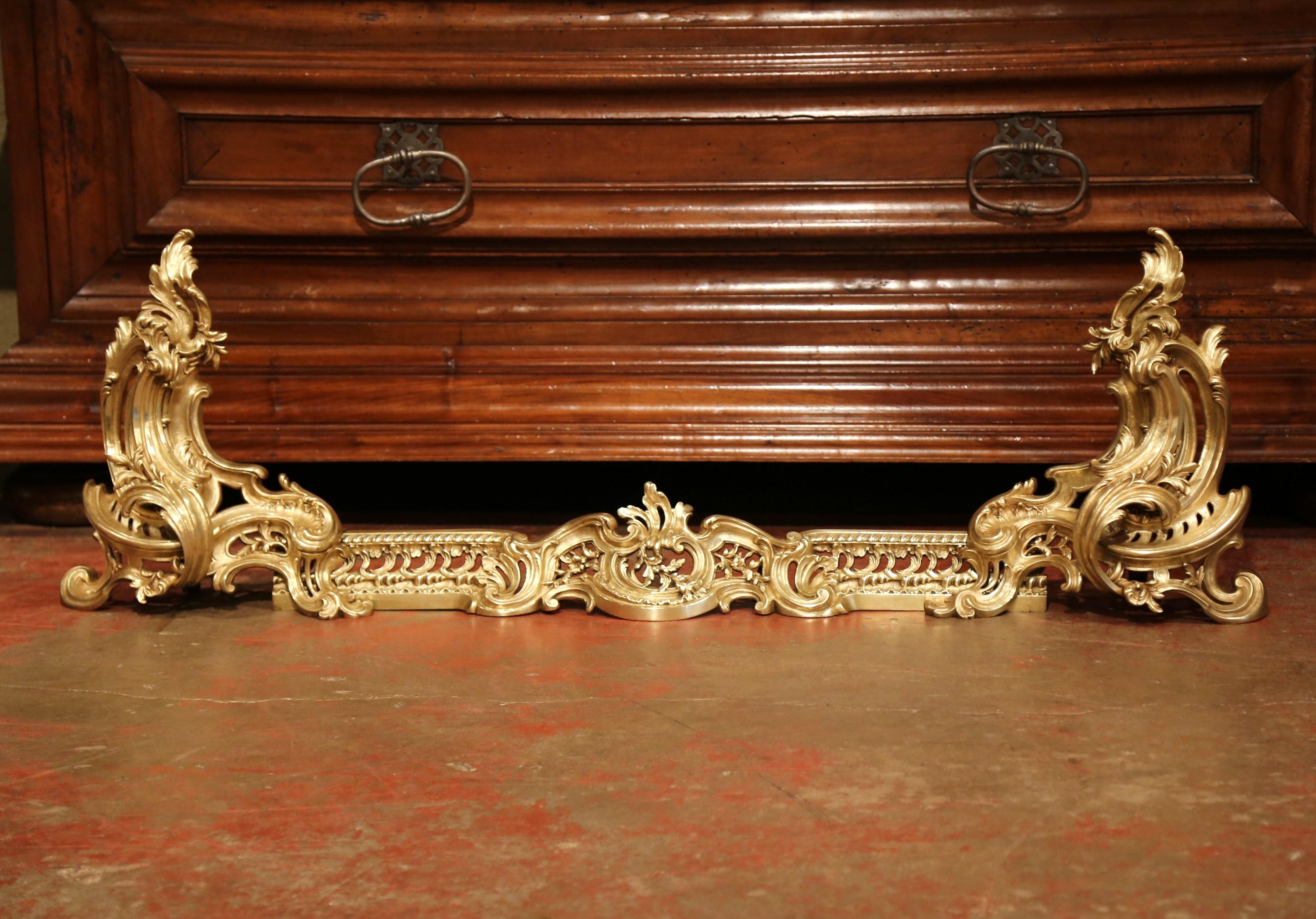 Pair of 19th Century French Louis XV Gilt Bronze Chenets with Matching Fender In Excellent Condition In Dallas, TX