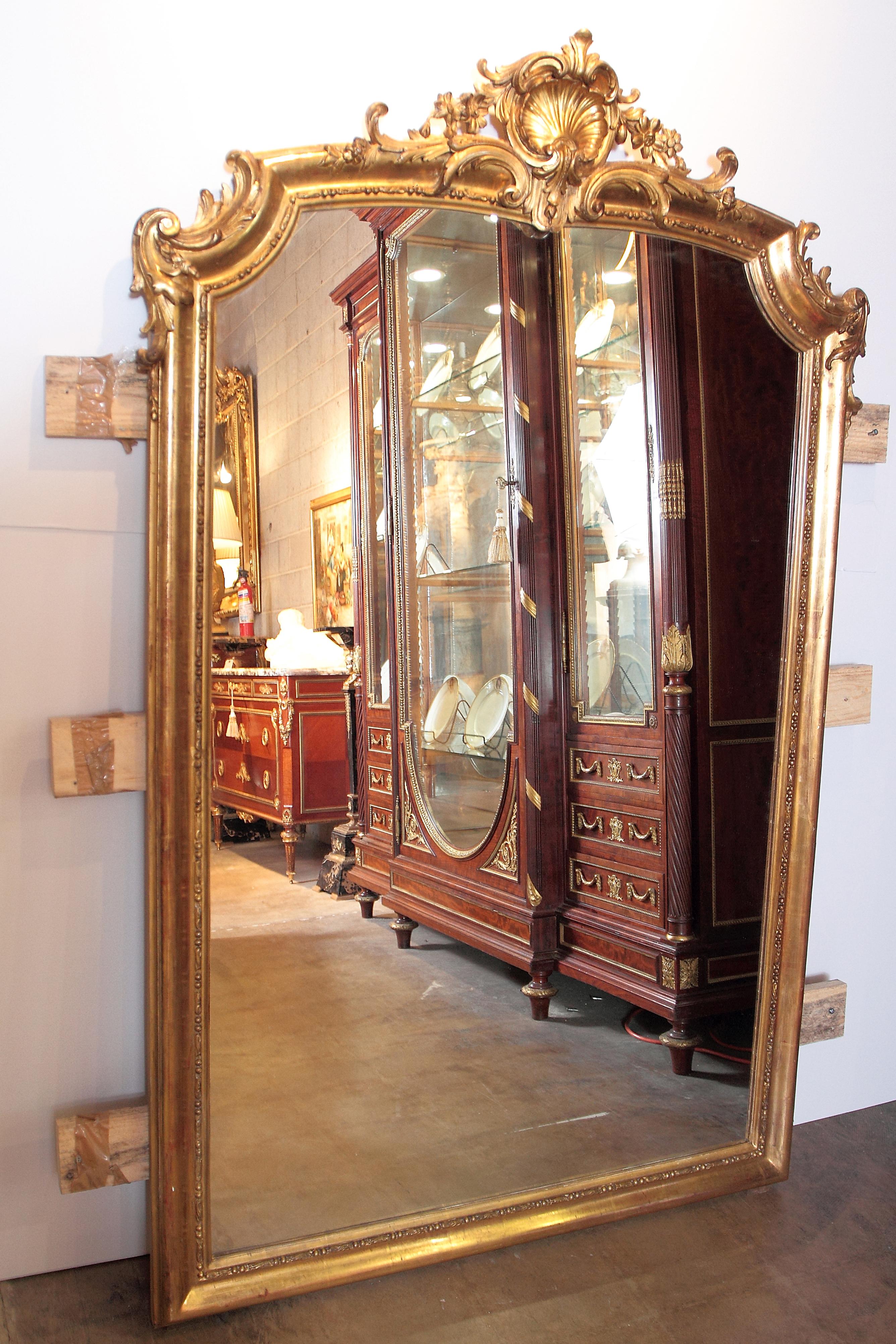 Pair of fine 19th century gilt carved Louis XV mirrors. Carved detail.